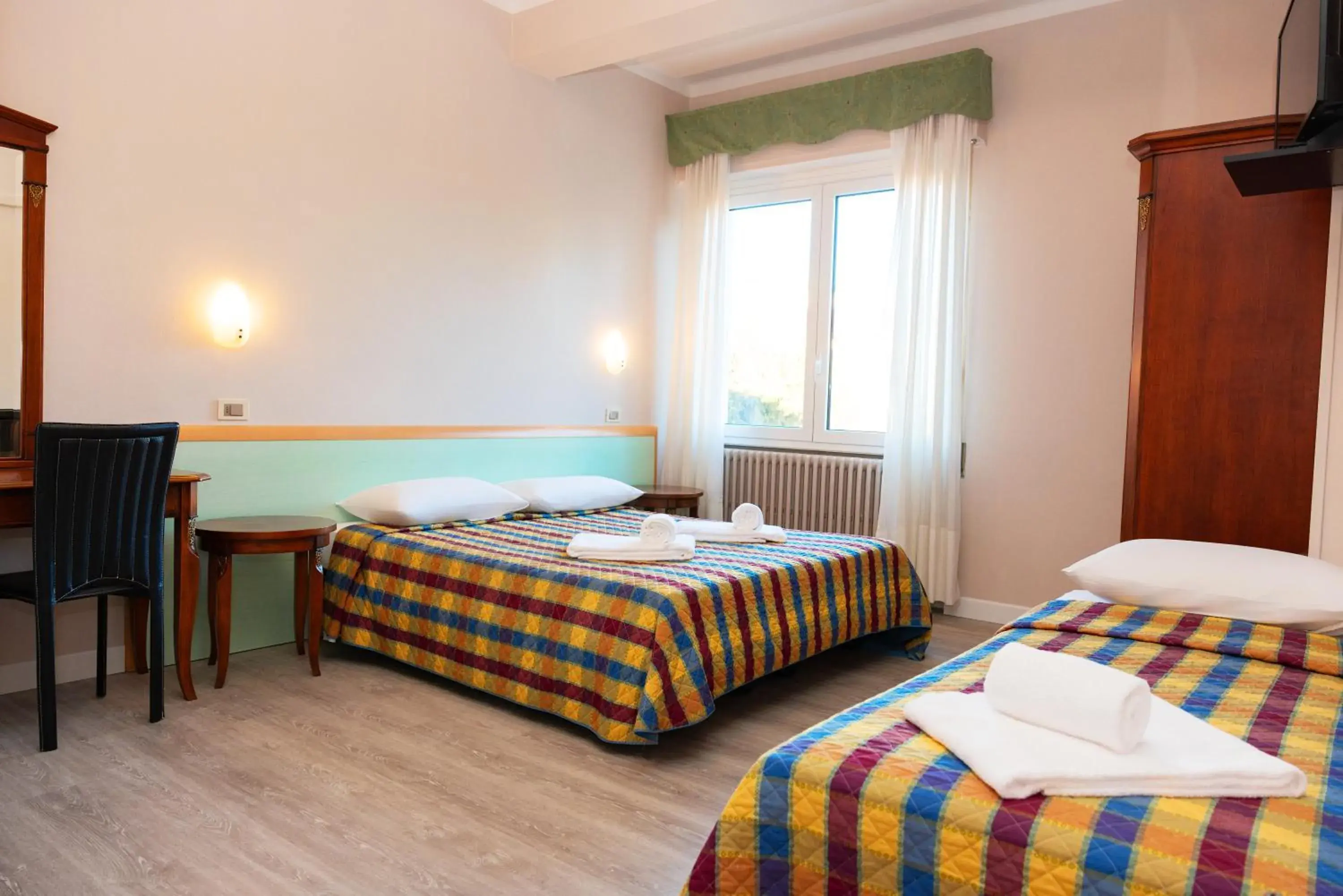 Triple Room in Hotel Astoria Triple Room in Hotel Astoria