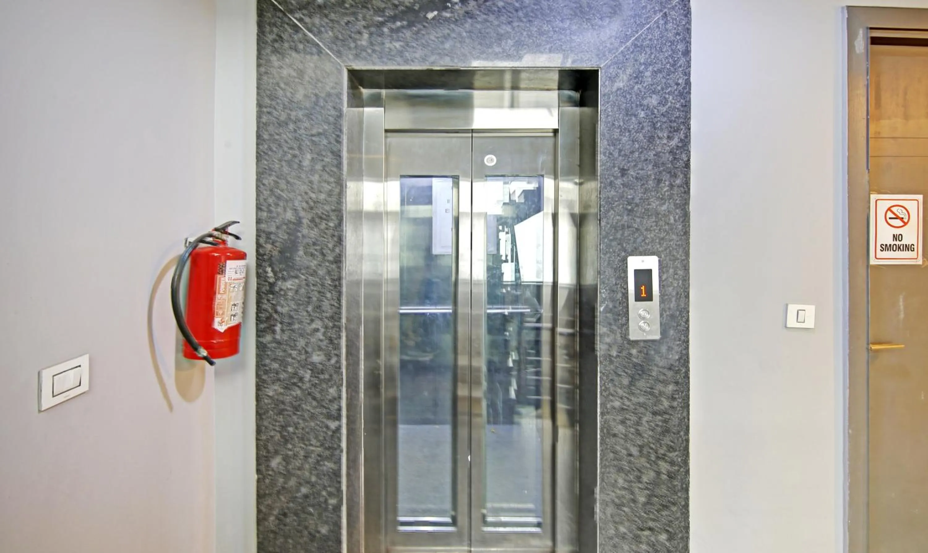 elevator in Treebo Ahinsa Residency Sohna Road