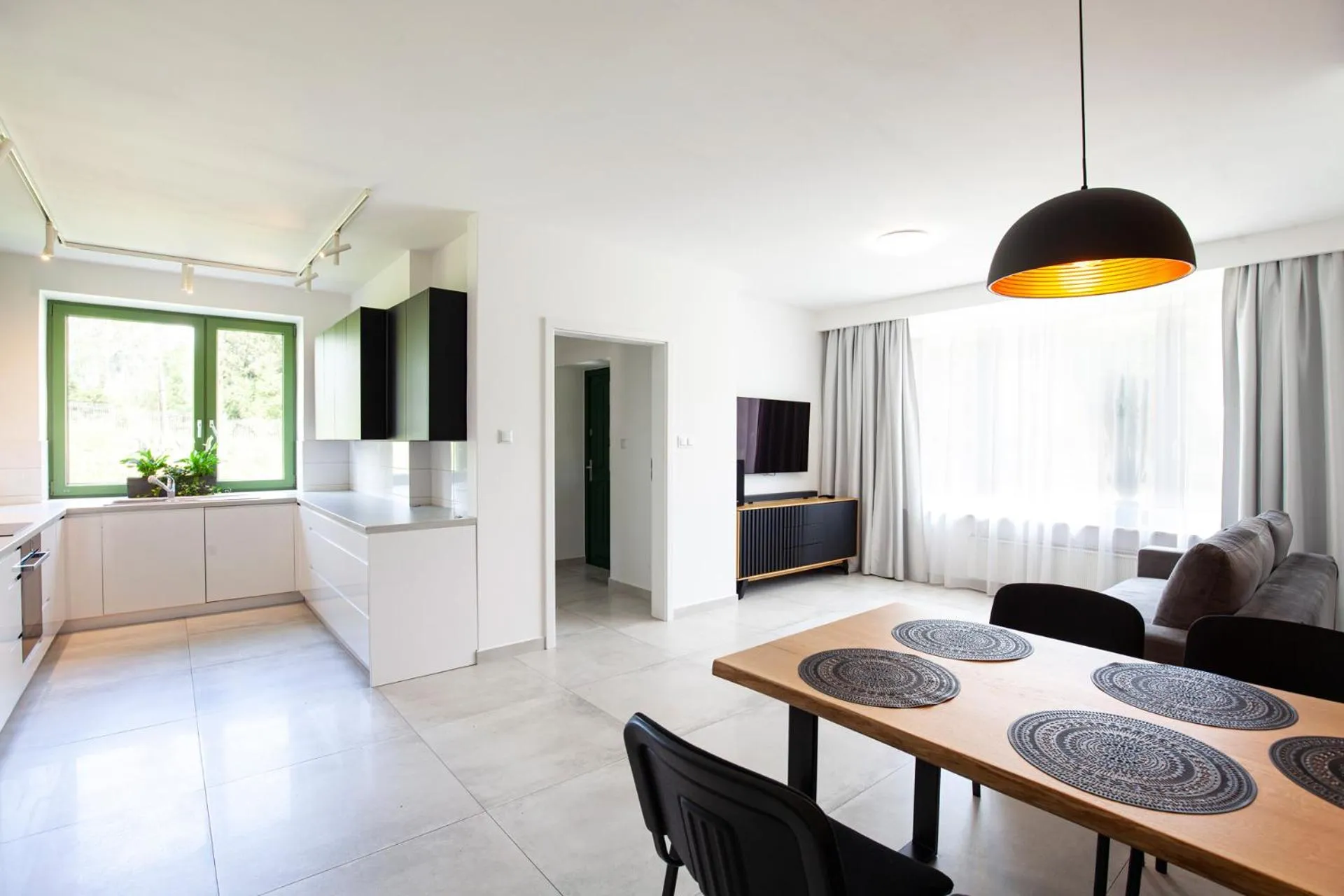 Kitchen or kitchenette in Holimo Hotel