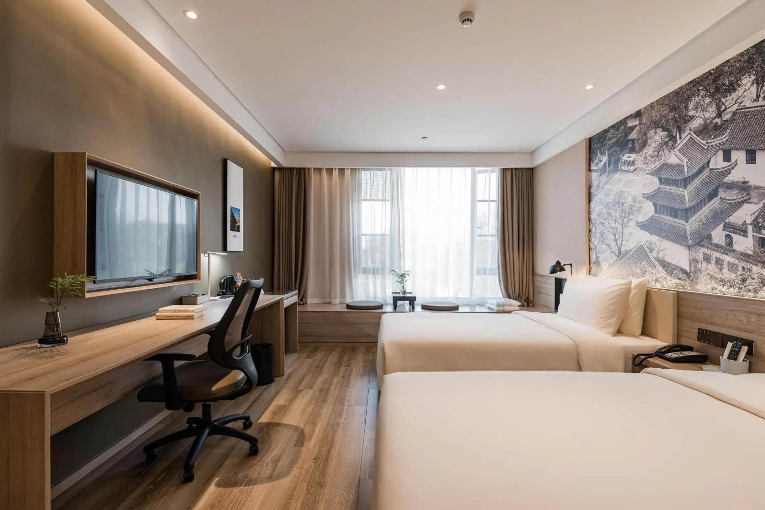 Bed in Atour Hotel Zhenjiang Xijindu Jinshan Temple