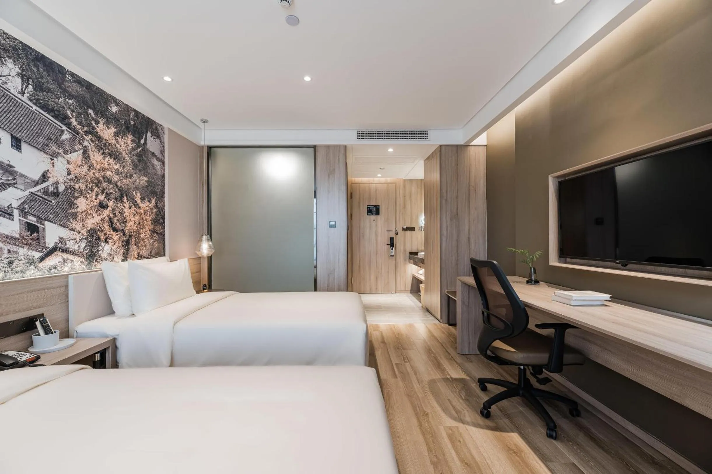 Bed in Atour Hotel Zhenjiang Xijindu Jinshan Temple