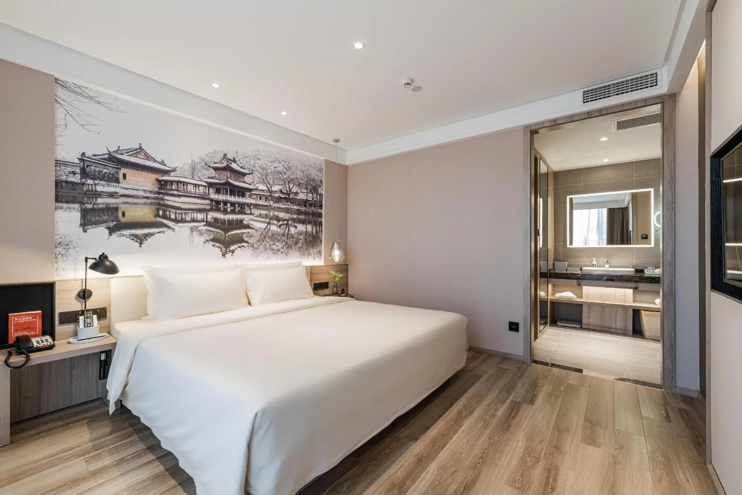 Bed in Atour Hotel Zhenjiang Xijindu Jinshan Temple