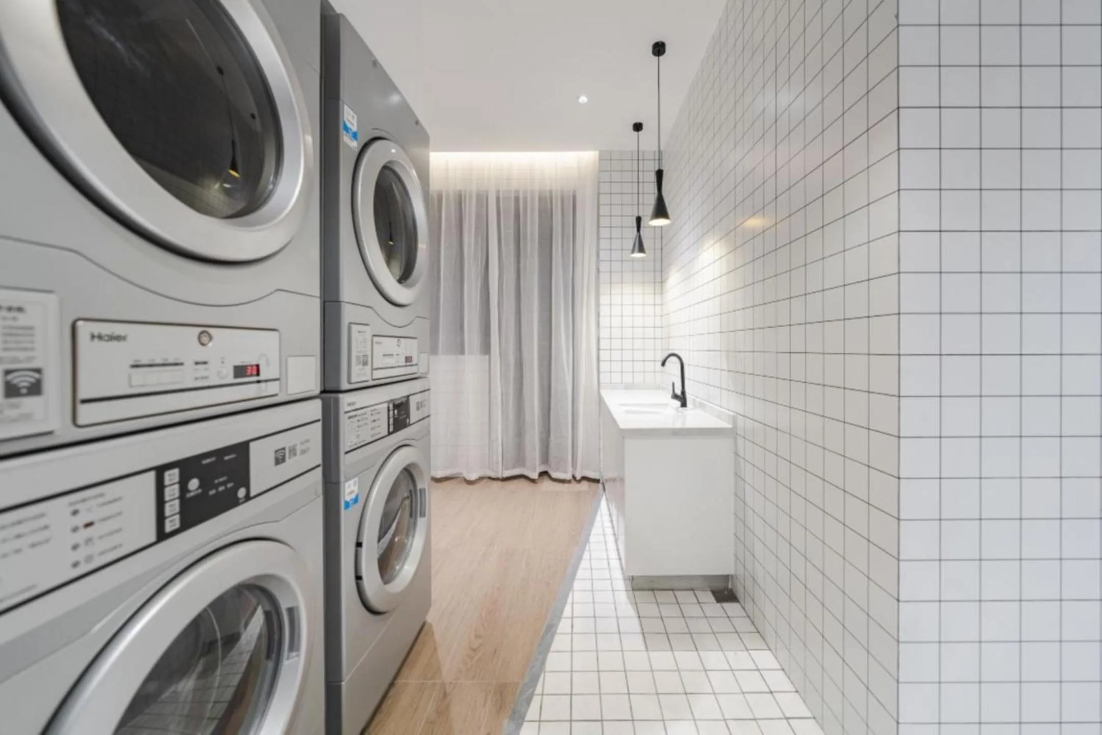 washing machine in Atour Hotel Lingang New Town