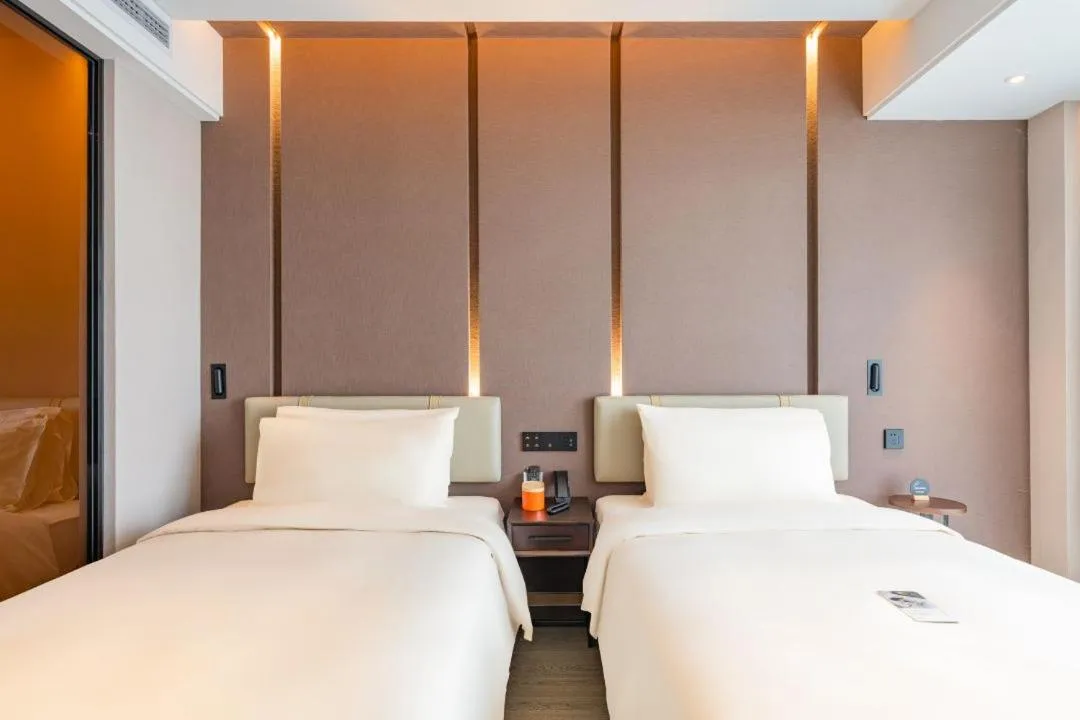 Bed in Atour Hotel Wuxi Huishan Wanda Plaza