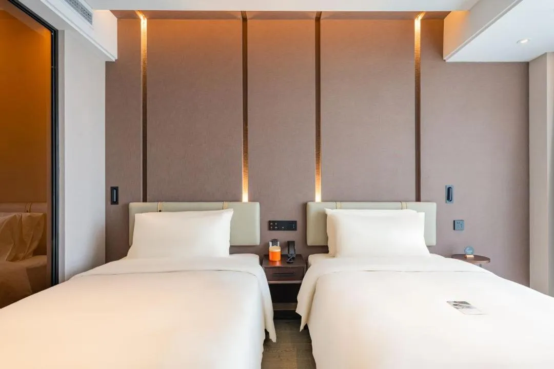 Bed in Atour Hotel Wuxi Huishan Wanda Plaza