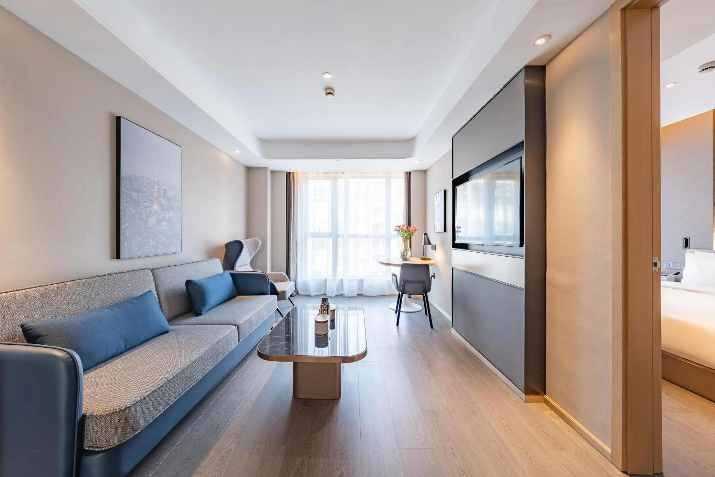 Living room, Bed in Atour Hotel Hangzhou Qianjiang Century Zhenning Road