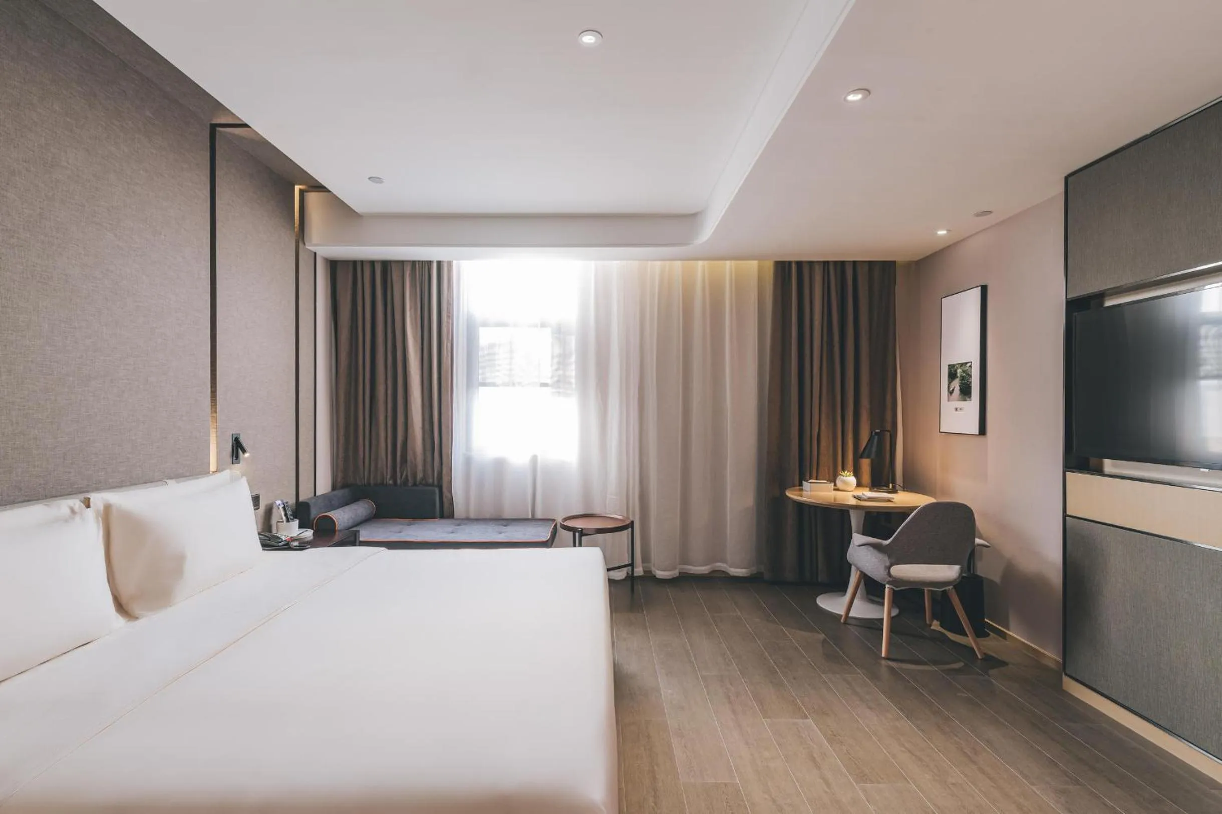 Bed in Atour Hotel Ningbo Jishi Harbor Outlets