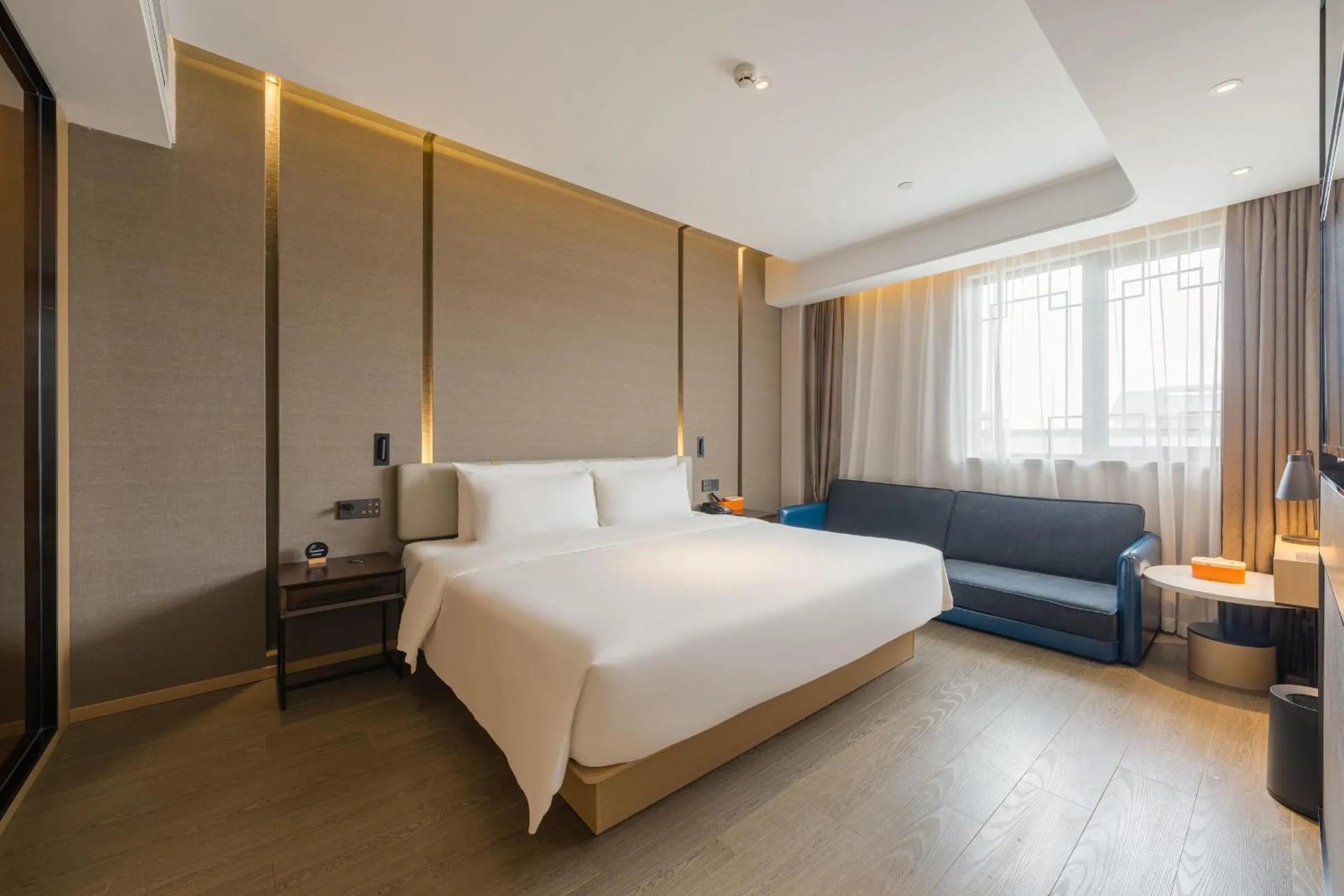 Bed in Atour Hotel Tongxiang Wuzhen