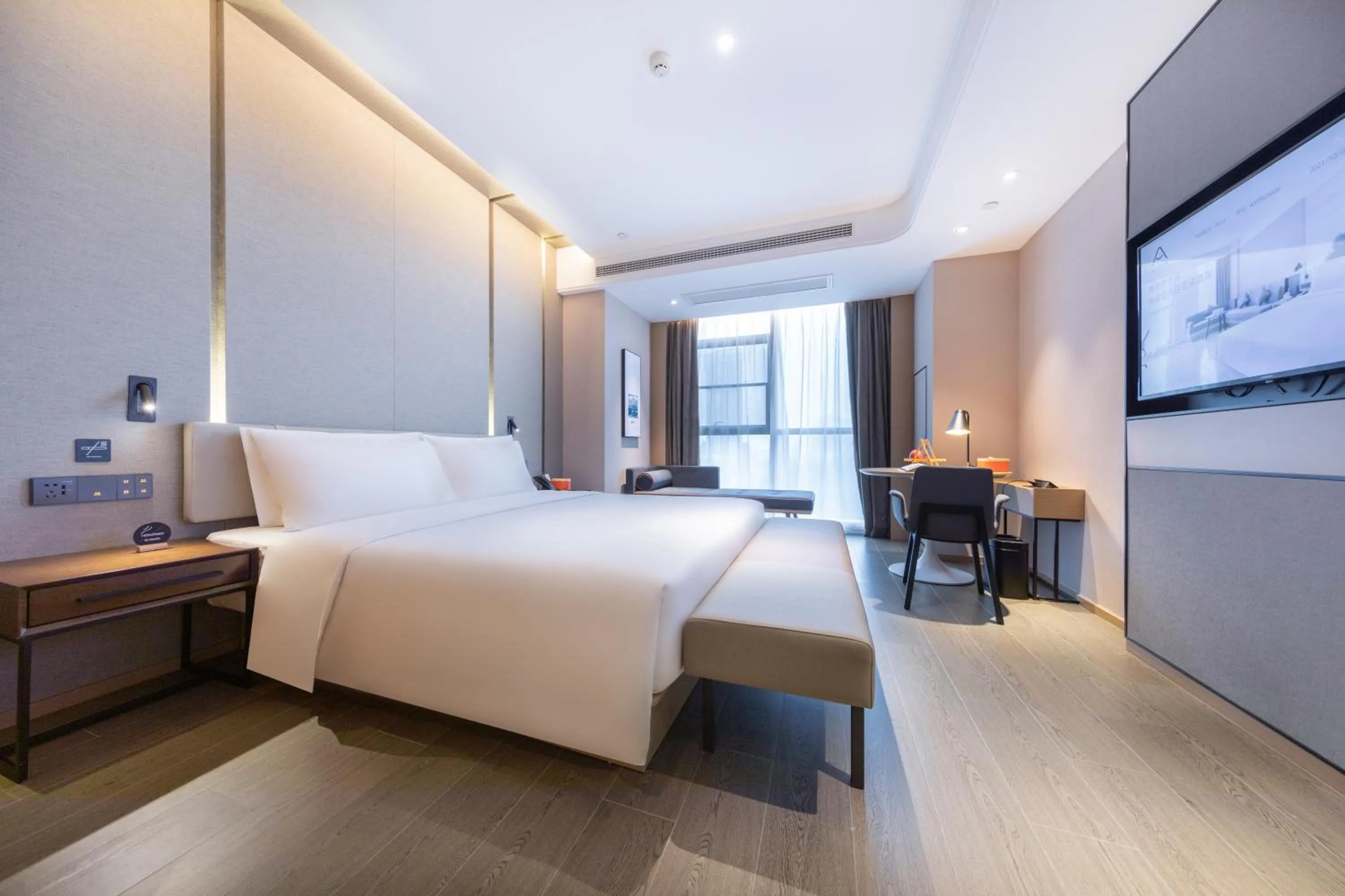 Bed in Atour Hotel Meishan Government Affairs Center