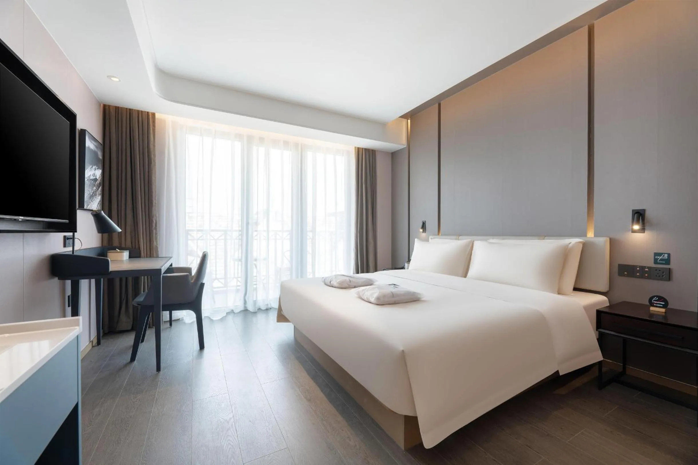 Bed in Atour Hotel Xishuangbanna Jinghong Gaozhuang Starlight Night Market