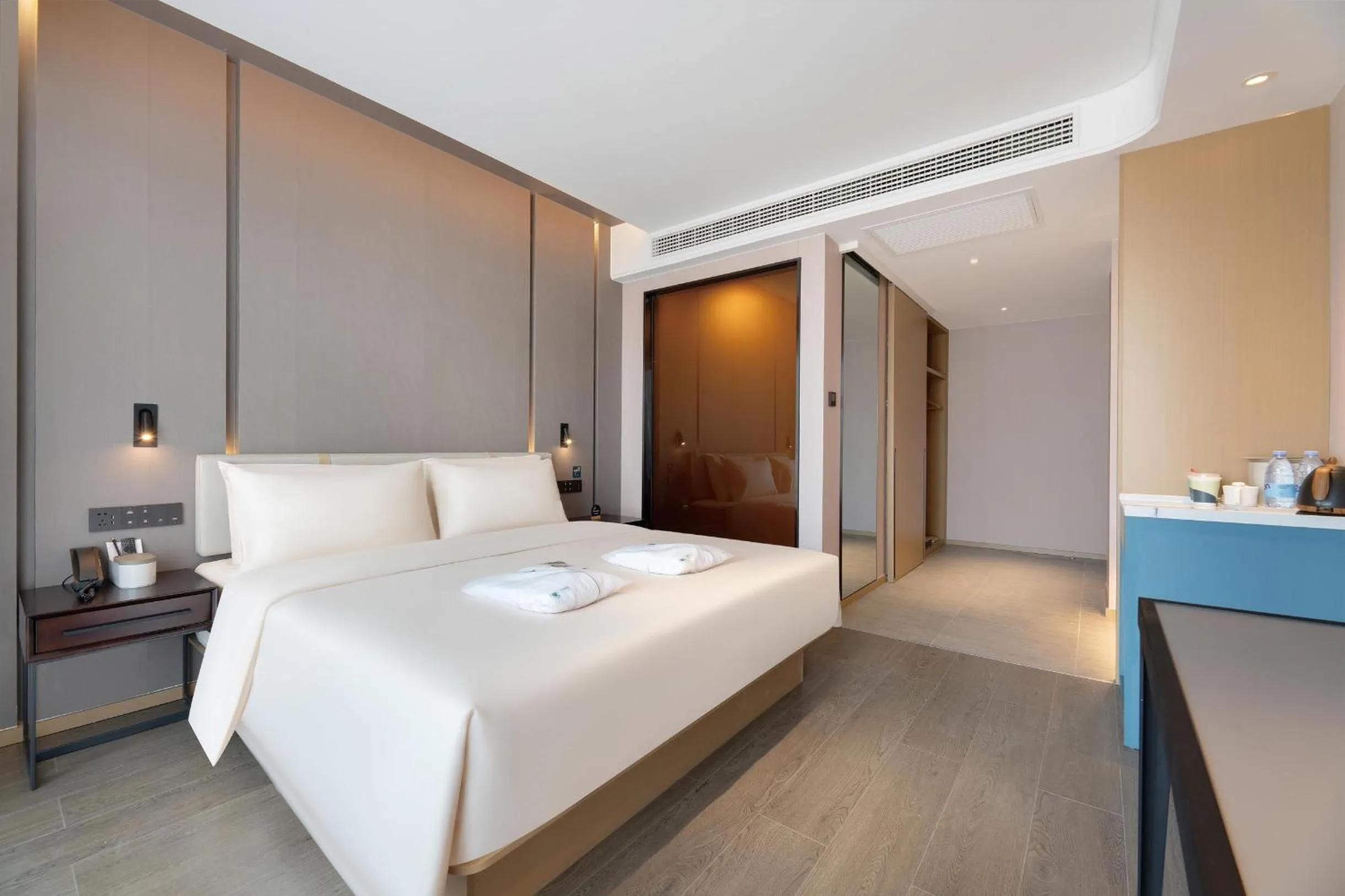 Bed in Atour Hotel Xishuangbanna Jinghong Gaozhuang Starlight Night Market