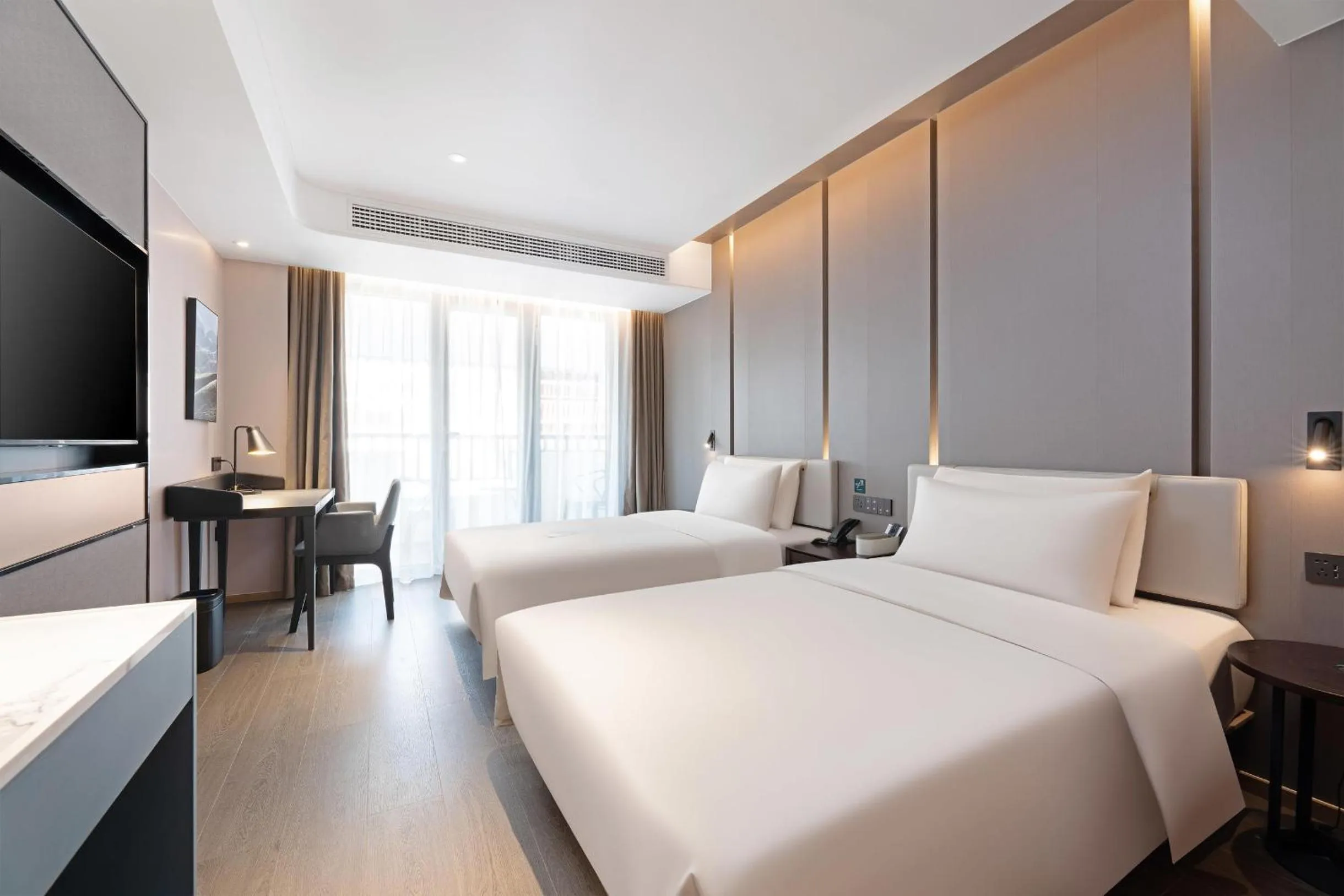 Bed in Atour Hotel Xishuangbanna Jinghong Gaozhuang Starlight Night Market