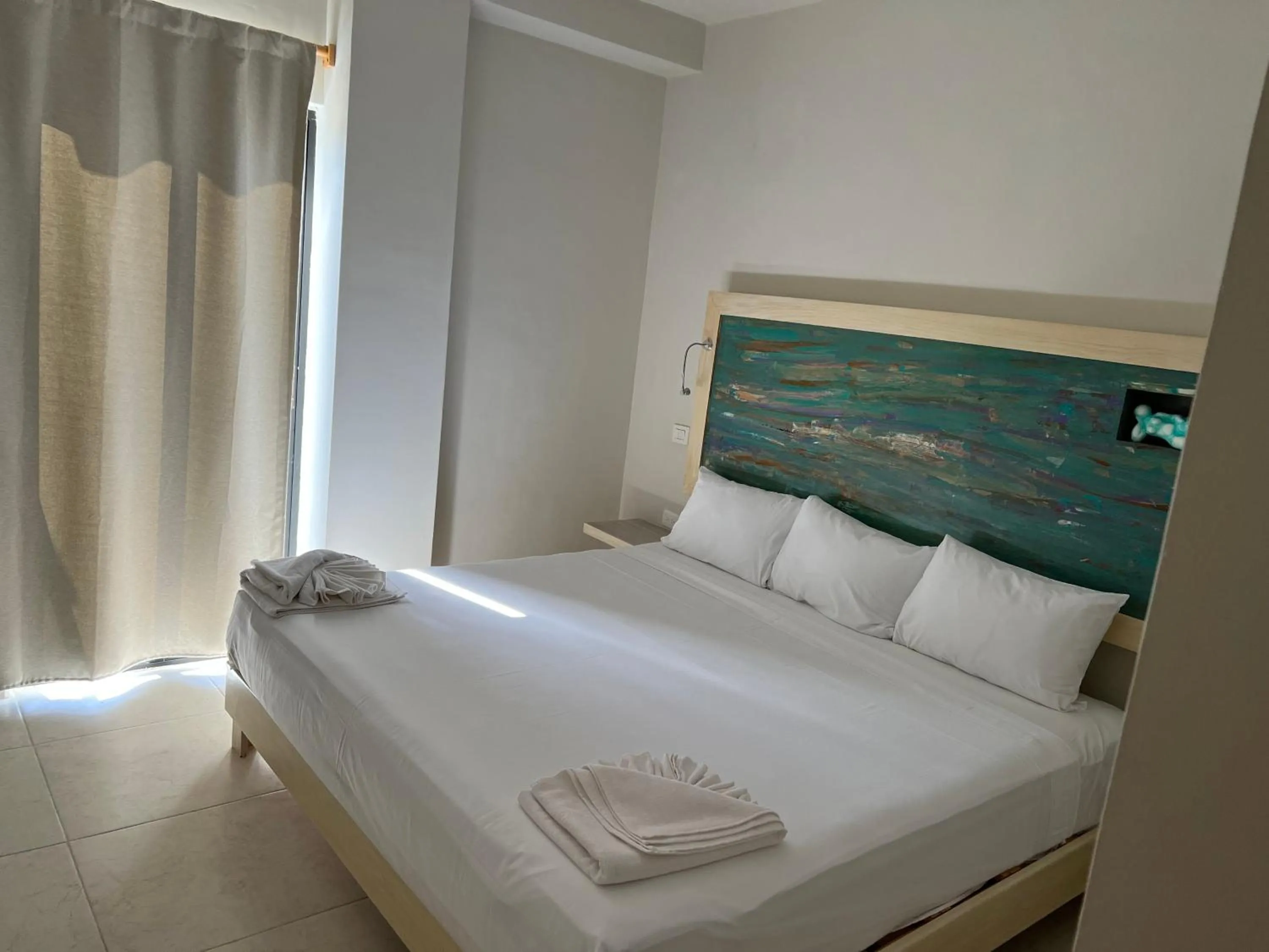 Bed in Hotel Inkanto