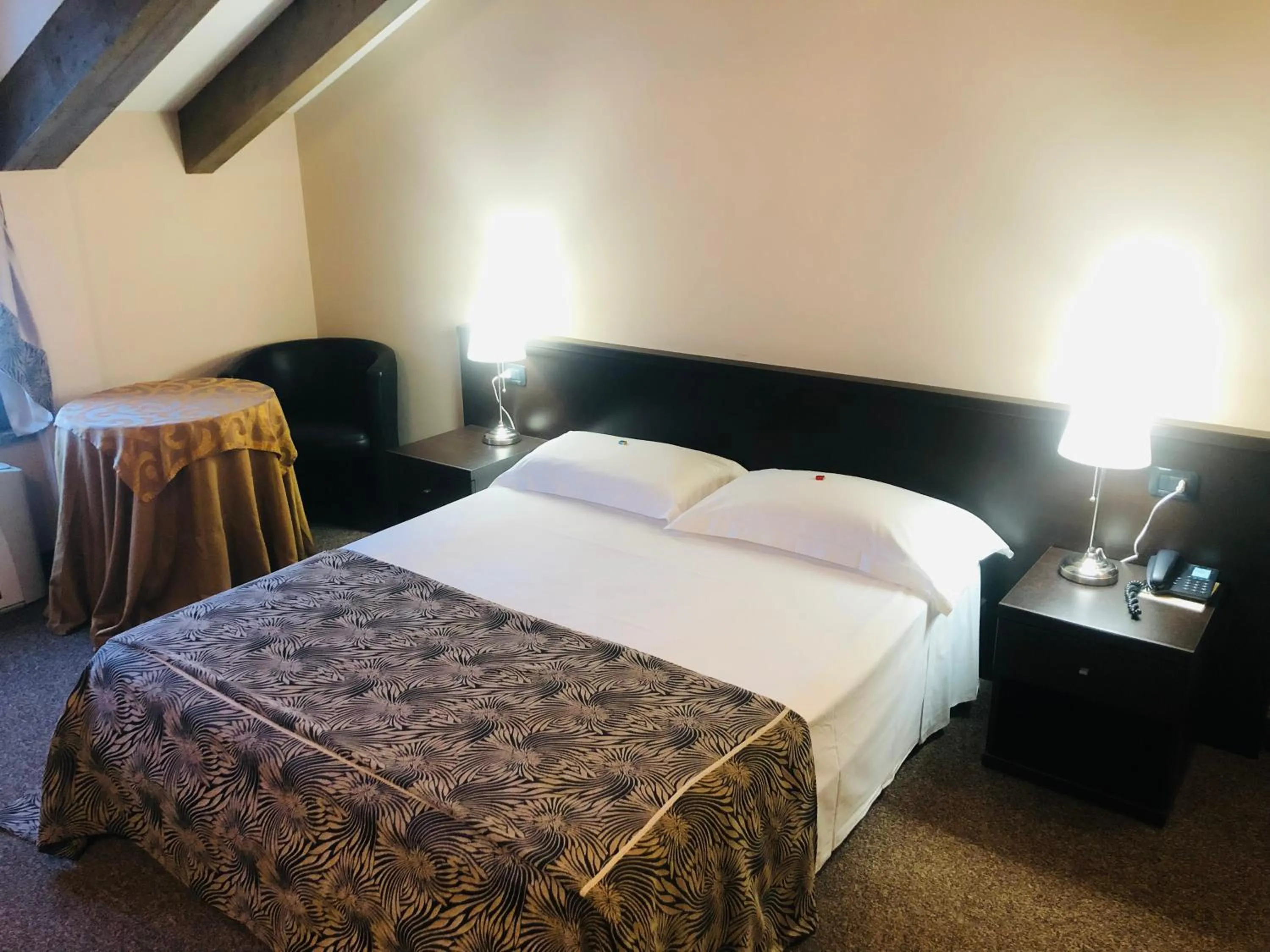 Photo of the whole room, Bed in Hotel Malpensa INN Aereoporto