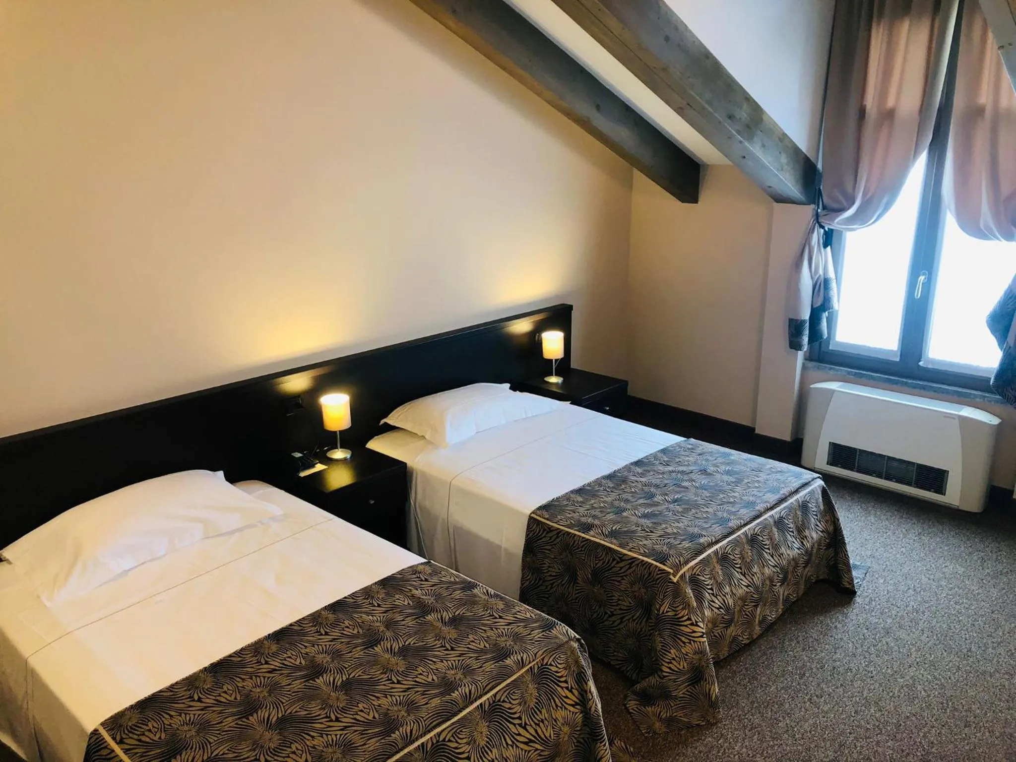 Bed in Hotel Malpensa INN Aereoporto