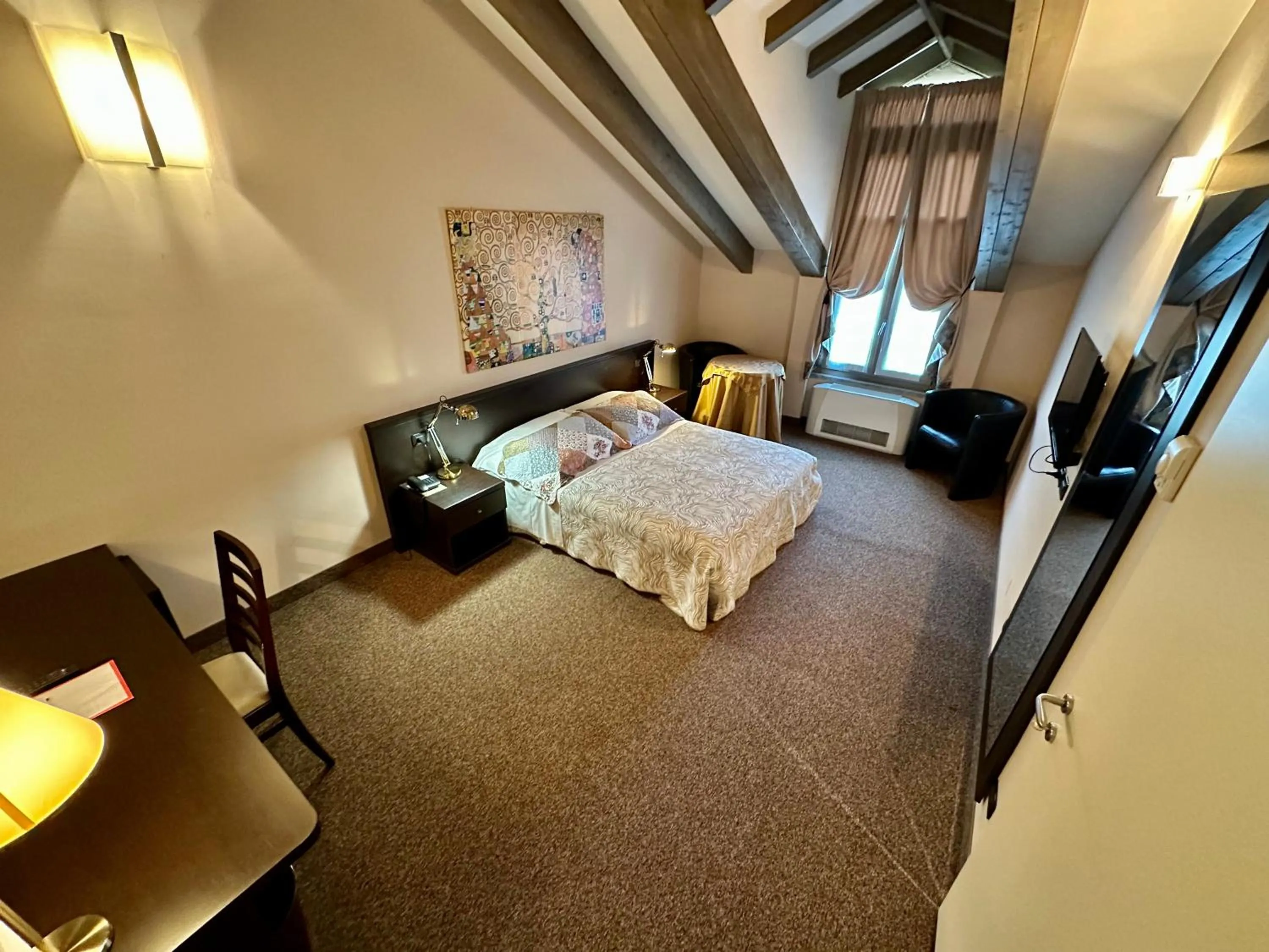 Photo of the whole room, Bed in Hotel Malpensa INN Aereoporto