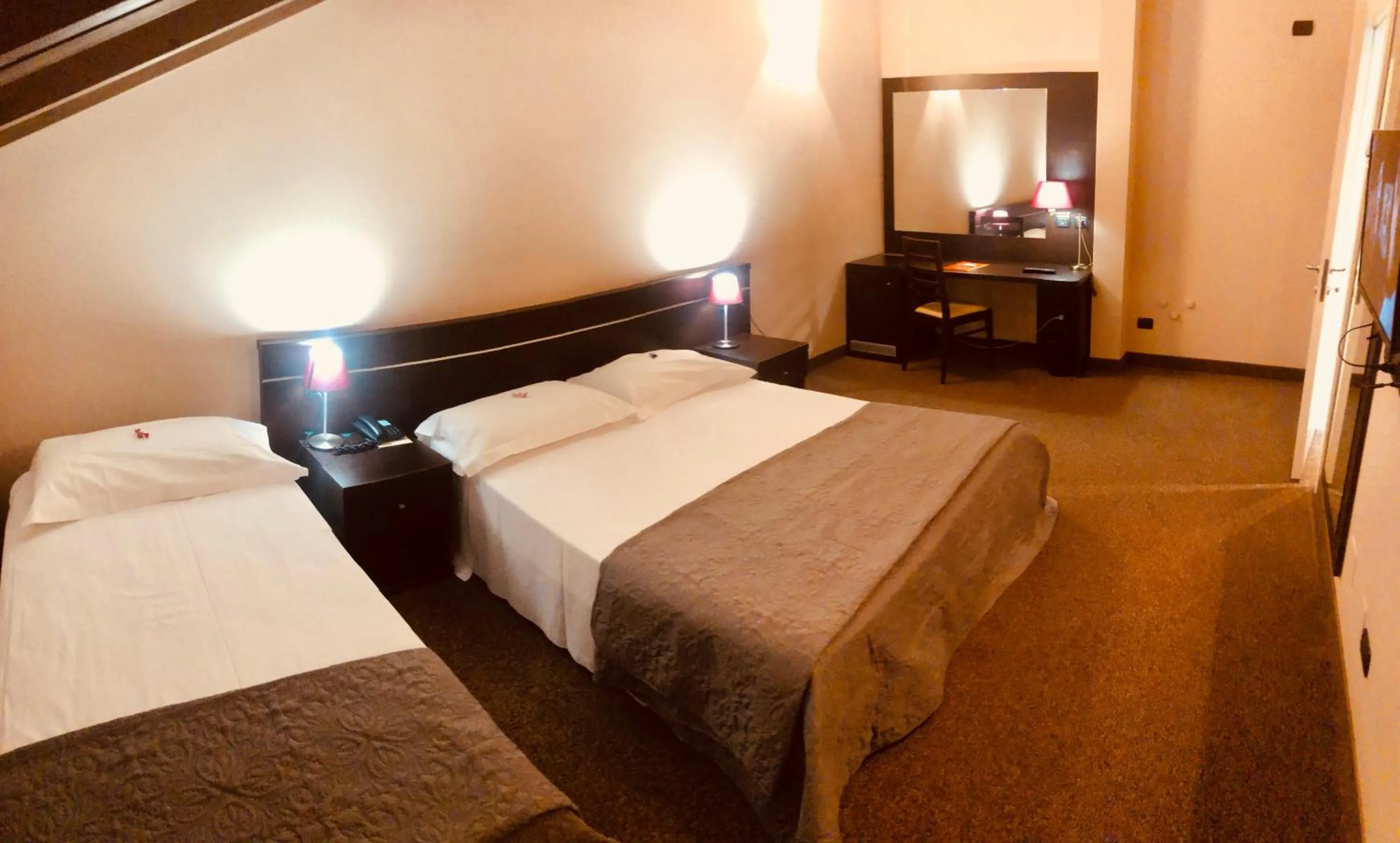 Photo of the whole room, Bed in Hotel Malpensa INN Aereoporto