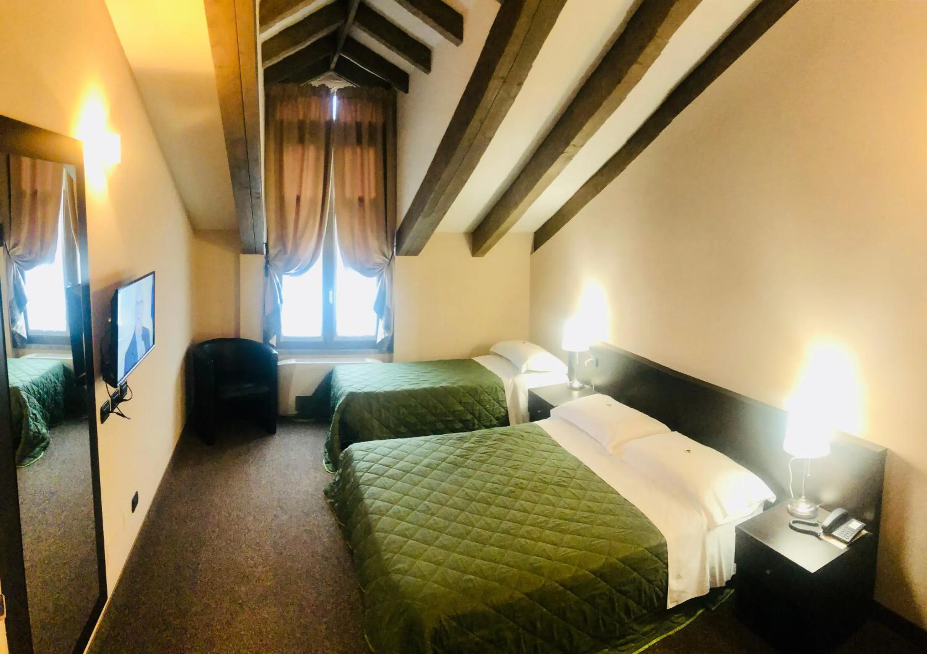 Bed in Hotel Malpensa INN Aereoporto