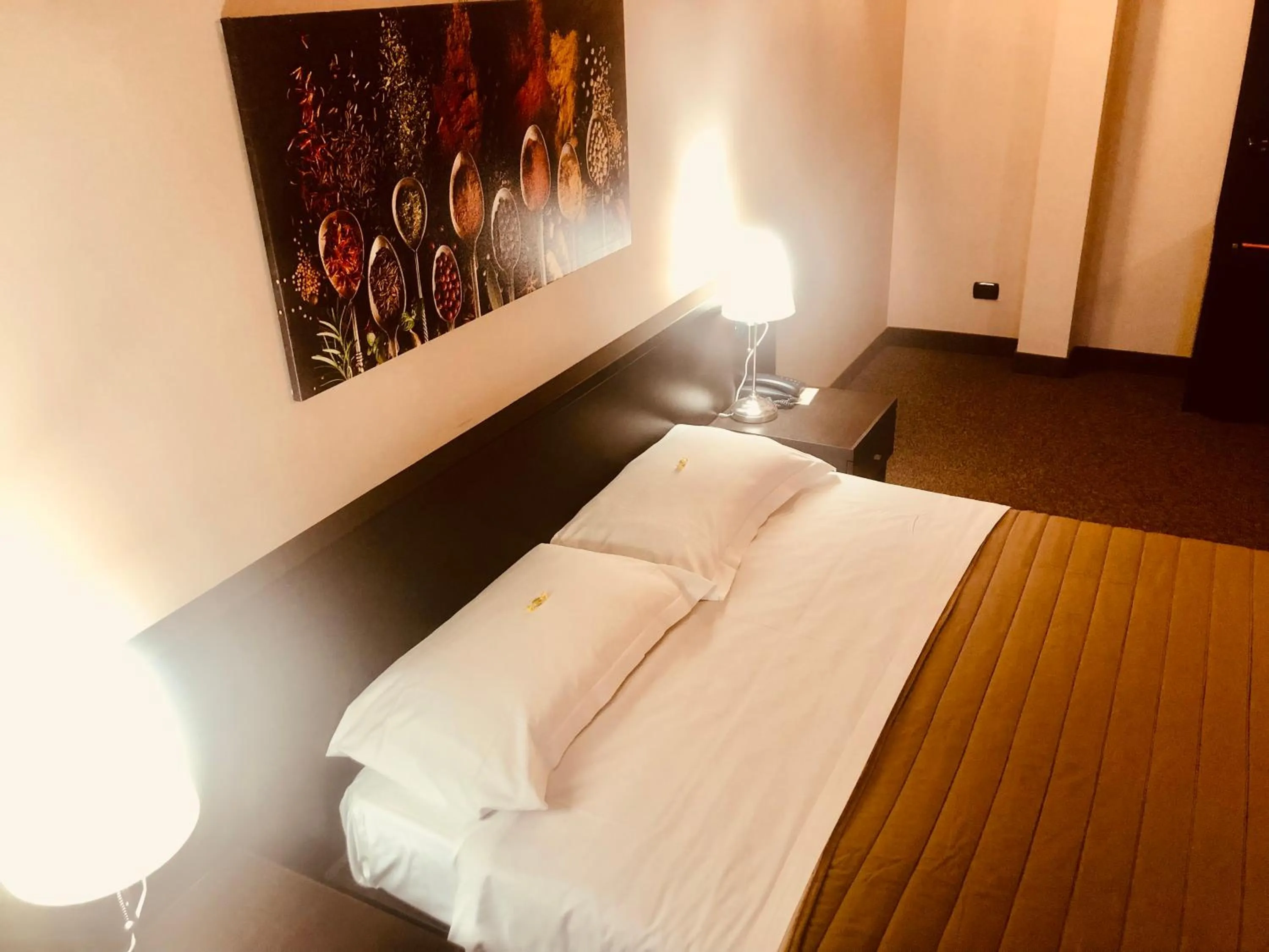 Bed in Hotel Malpensa INN Aereoporto