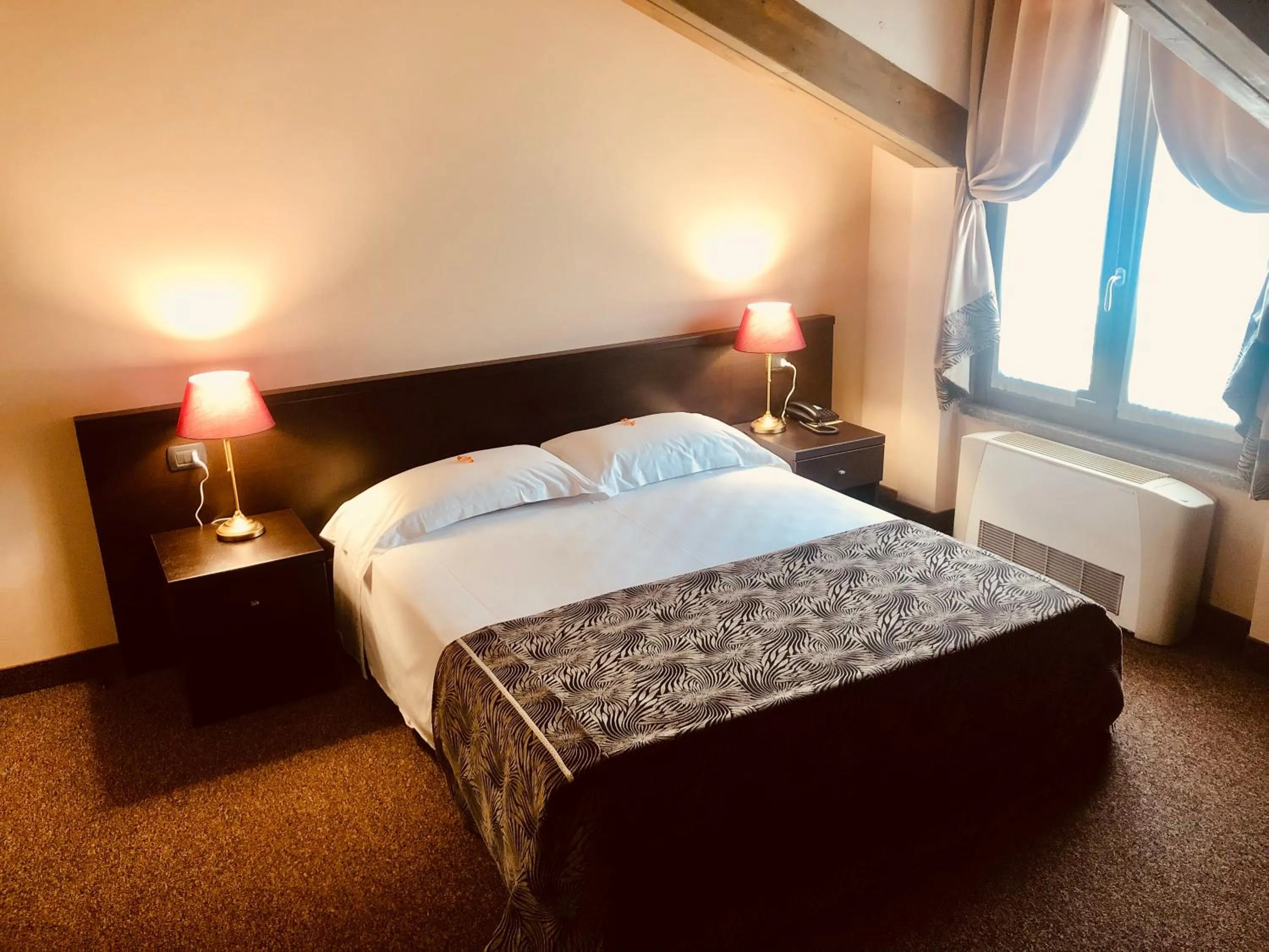 Bed in Hotel Malpensa INN Aereoporto