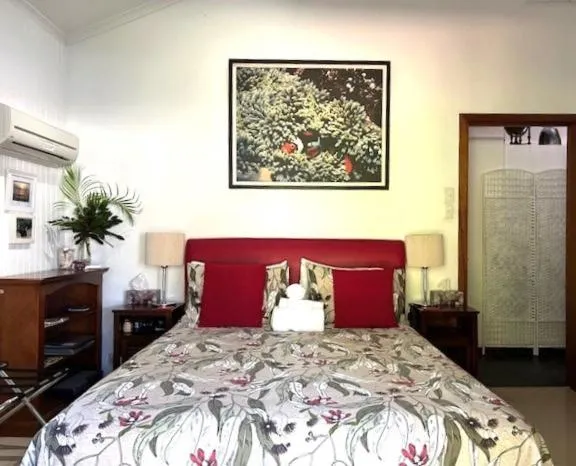 Bed in South Pacific Bed & Breakfast