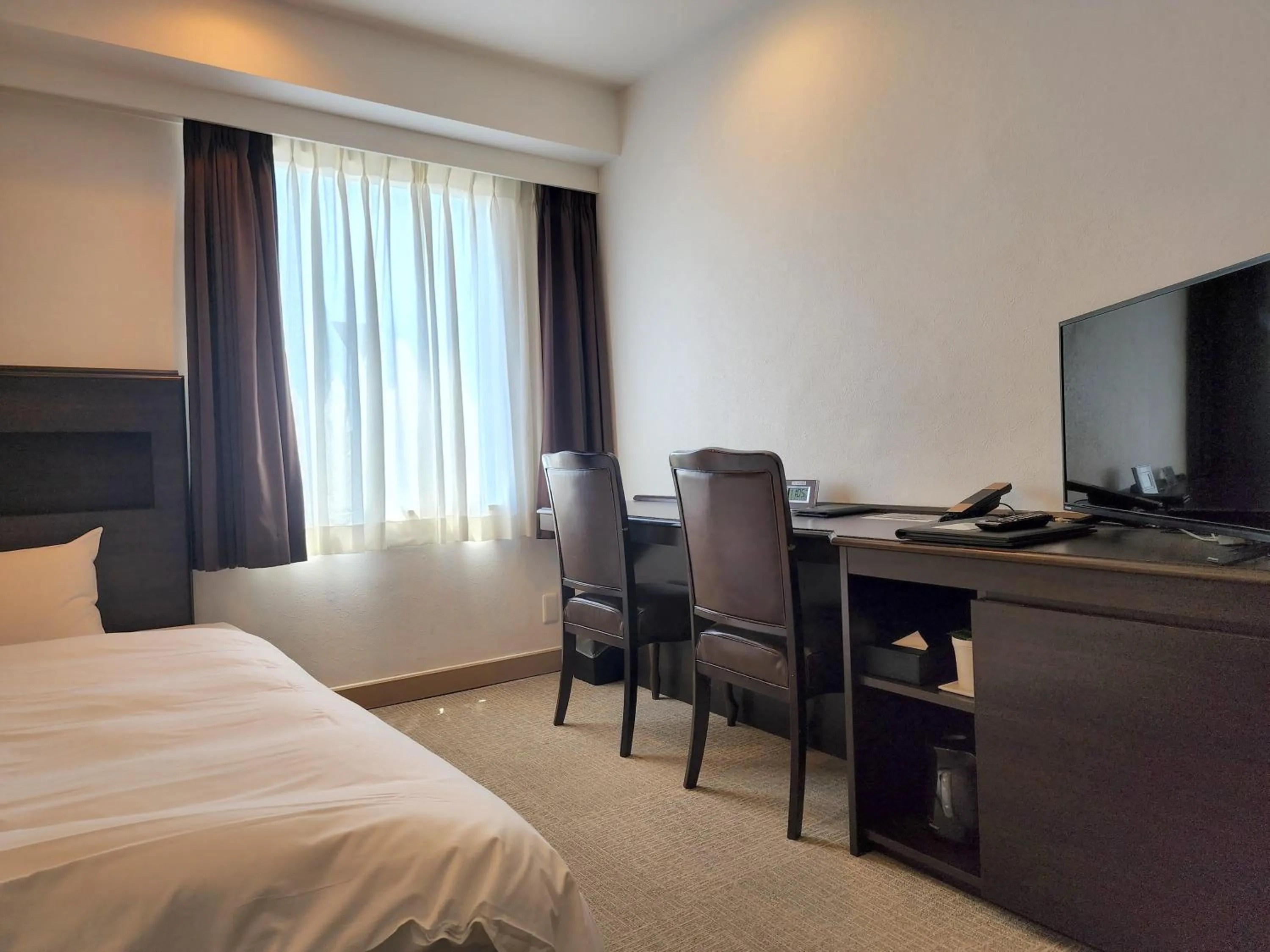 Bed in Platon Hotel Yokkaichi