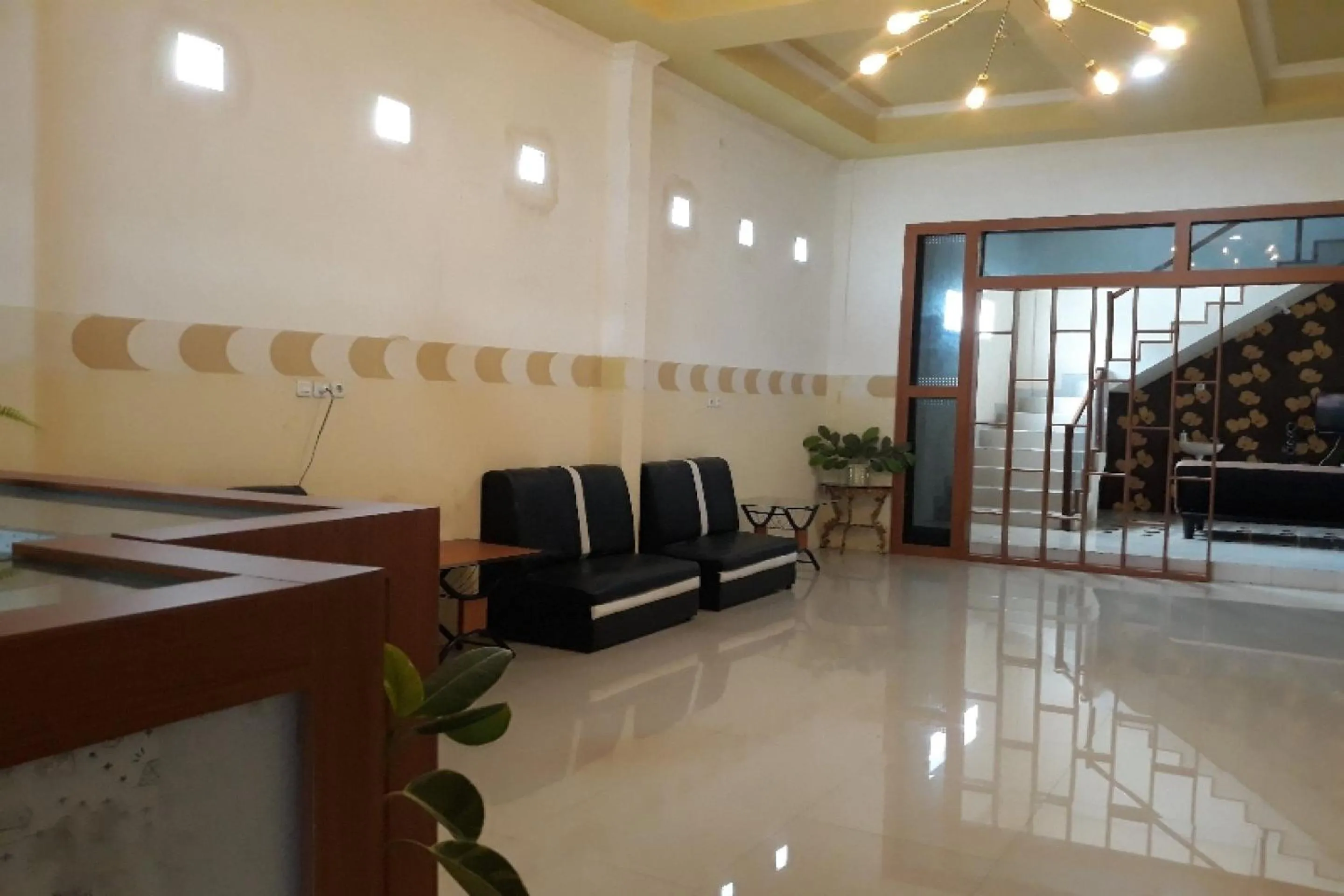 Lobby or reception in OYO 91162 Homestay Ansyariah Syariah