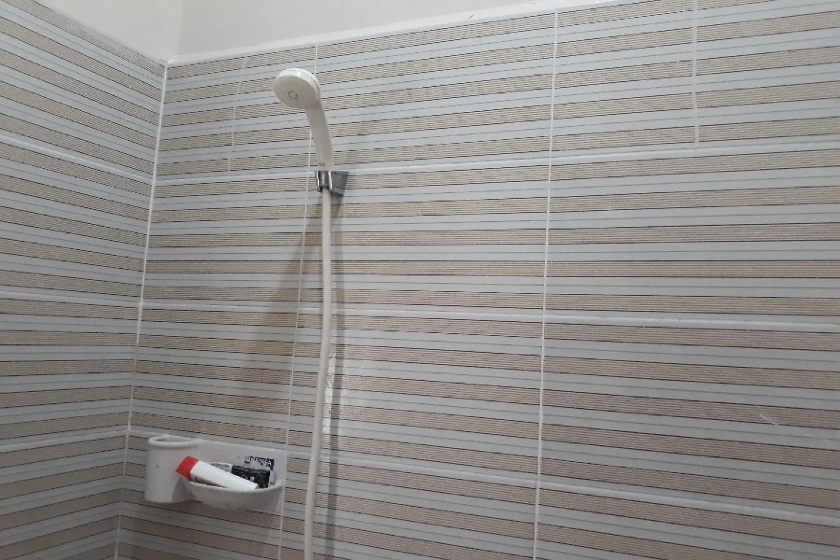 Bathroom in OYO 91162 Homestay Ansyariah Syariah