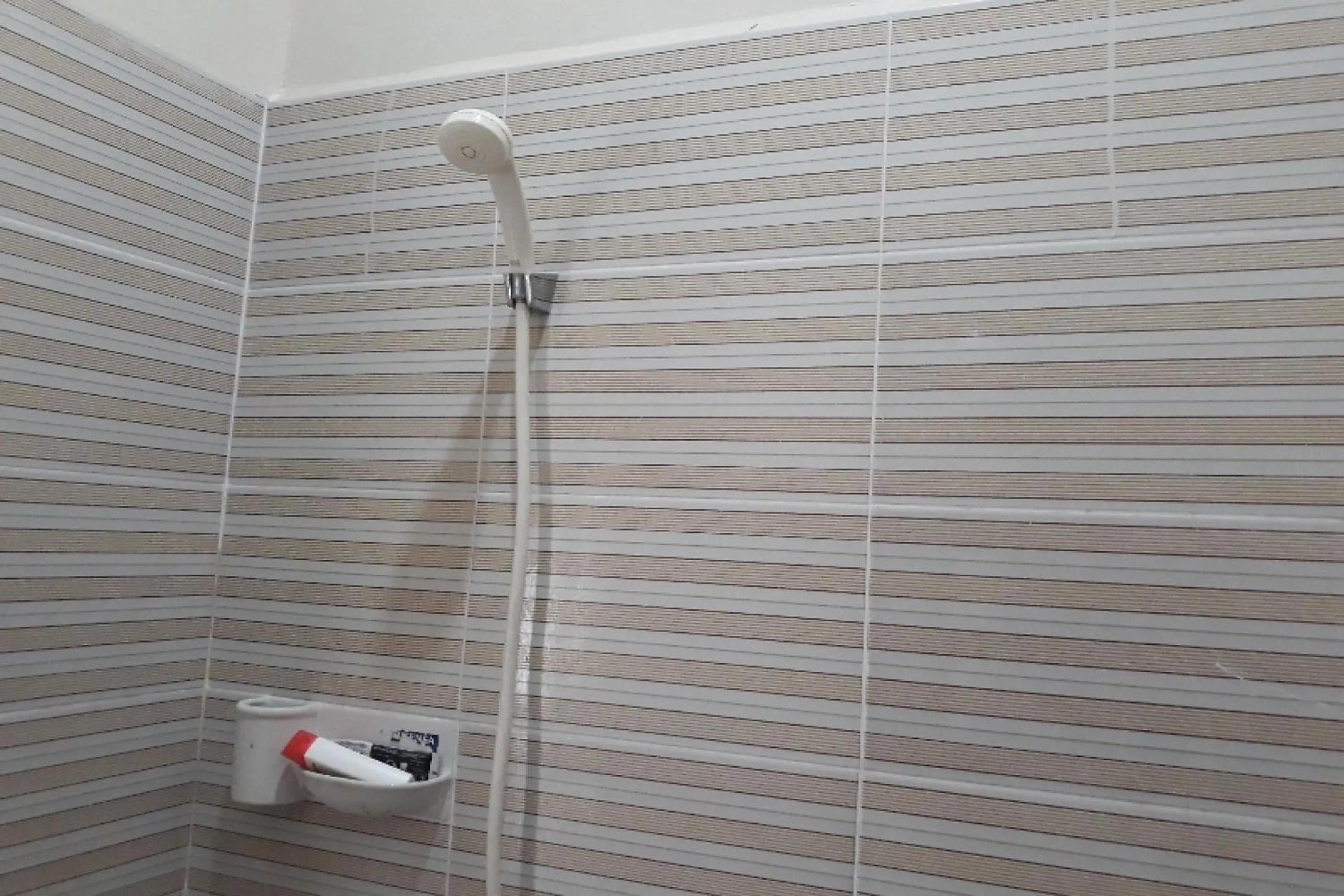 Bathroom in OYO 91162 Homestay Ansyariah Syariah