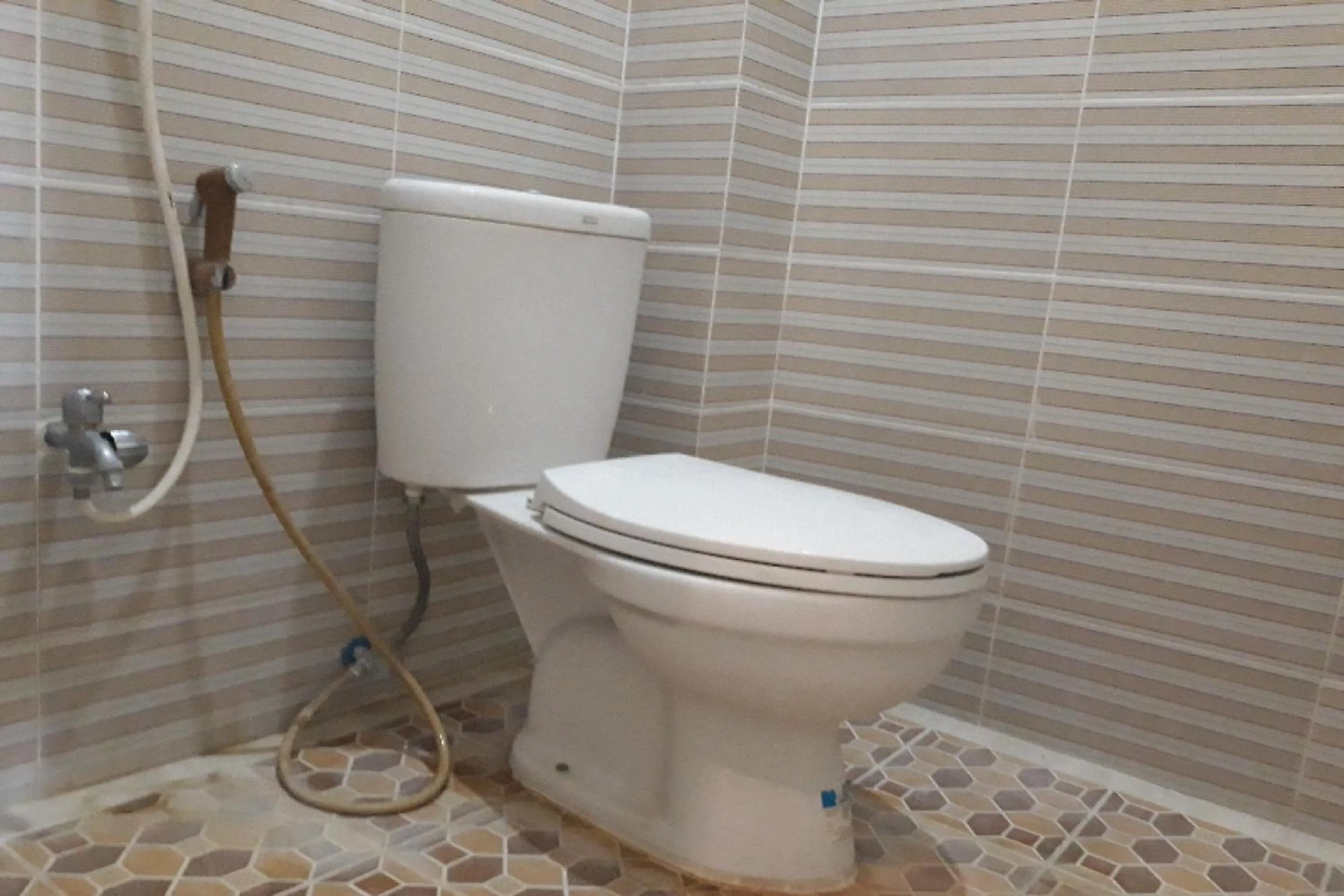 Bathroom in OYO 91162 Homestay Ansyariah Syariah