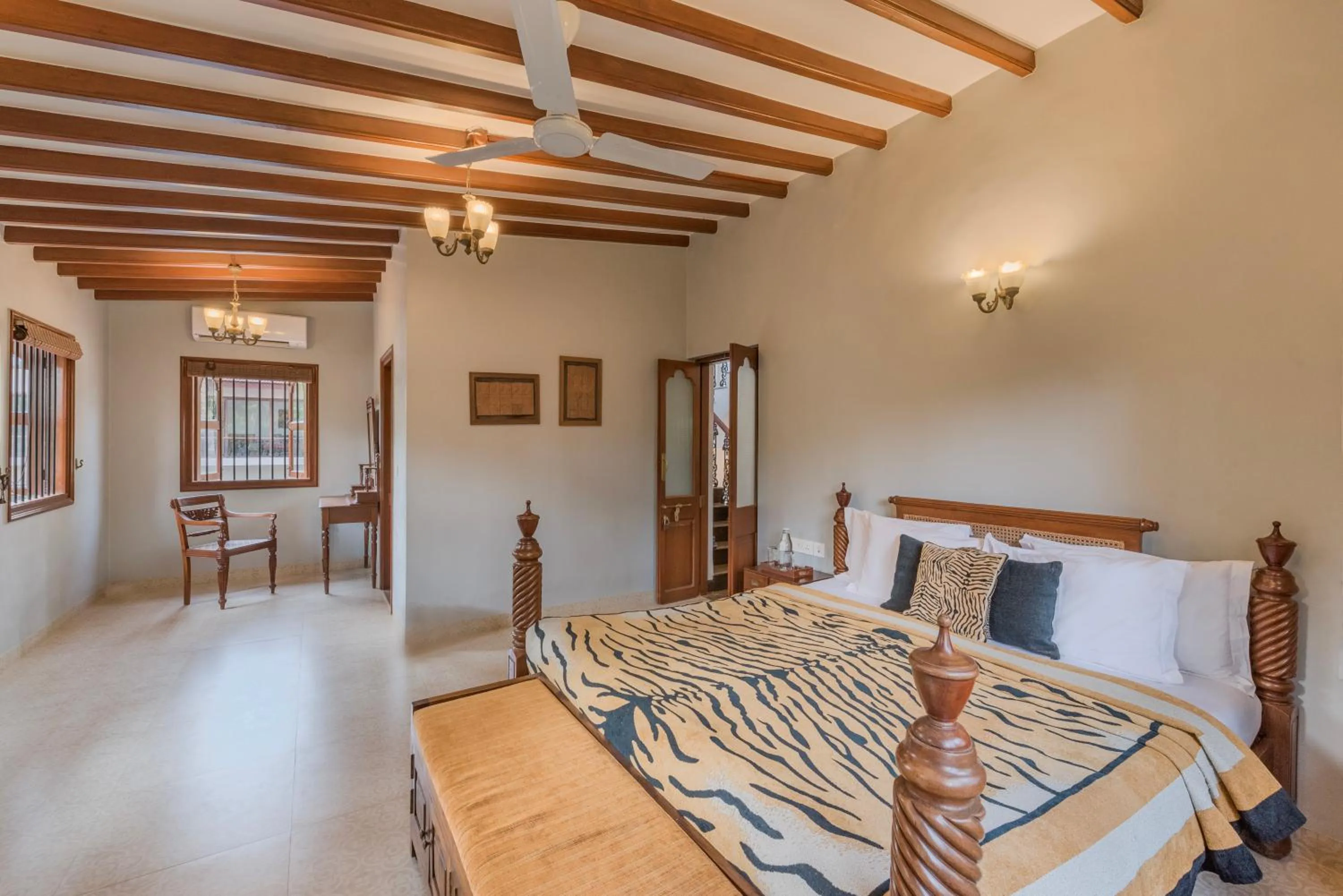 Bed in SaffronStays Casa Del Palms - 8BR luxury pool villa with gazebo, pickleball, bar & lawns near Nagaon Beach