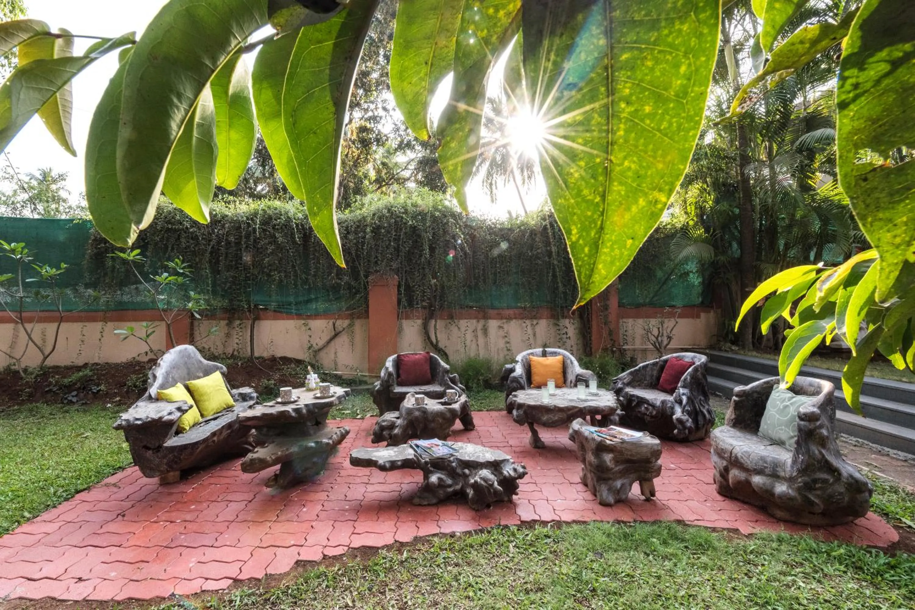 Day in SaffronStays Casa Del Palms - 8BR luxury pool villa with gazebo, pickleball, bar & lawns near Nagaon Beach