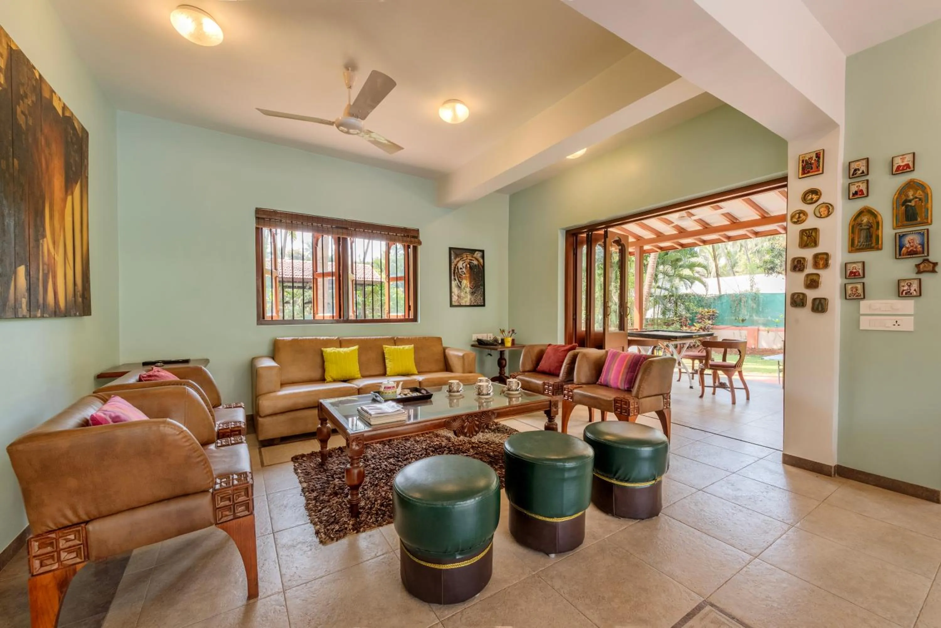 Living room in SaffronStays Casa Del Palms - 8BR luxury pool villa with gazebo, pickleball, bar & lawns near Nagaon Beach