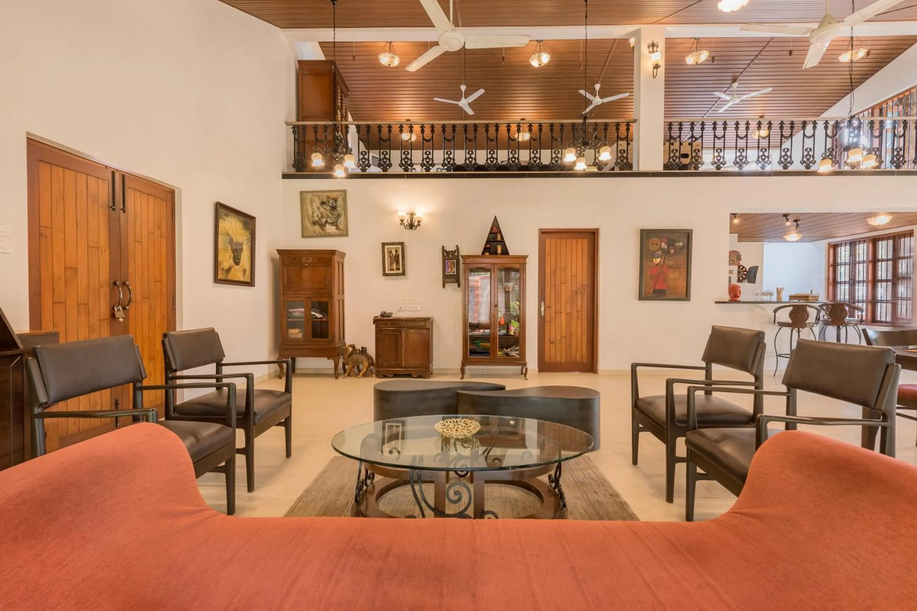 Living room in SaffronStays Casa Del Palms - 8BR luxury pool villa with gazebo, pickleball, bar & lawns near Nagaon Beach