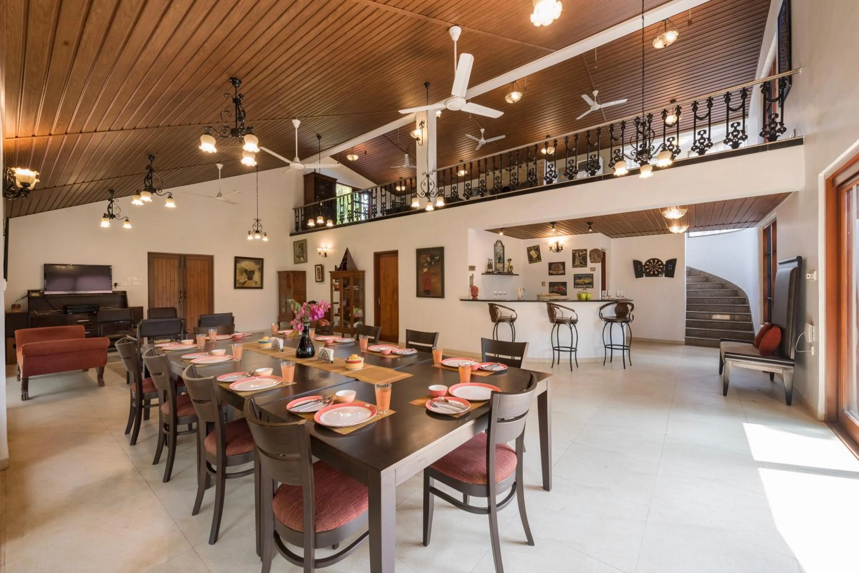 Living room in SaffronStays Casa Del Palms - 8BR luxury pool villa with gazebo, pickleball, bar & lawns near Nagaon Beach