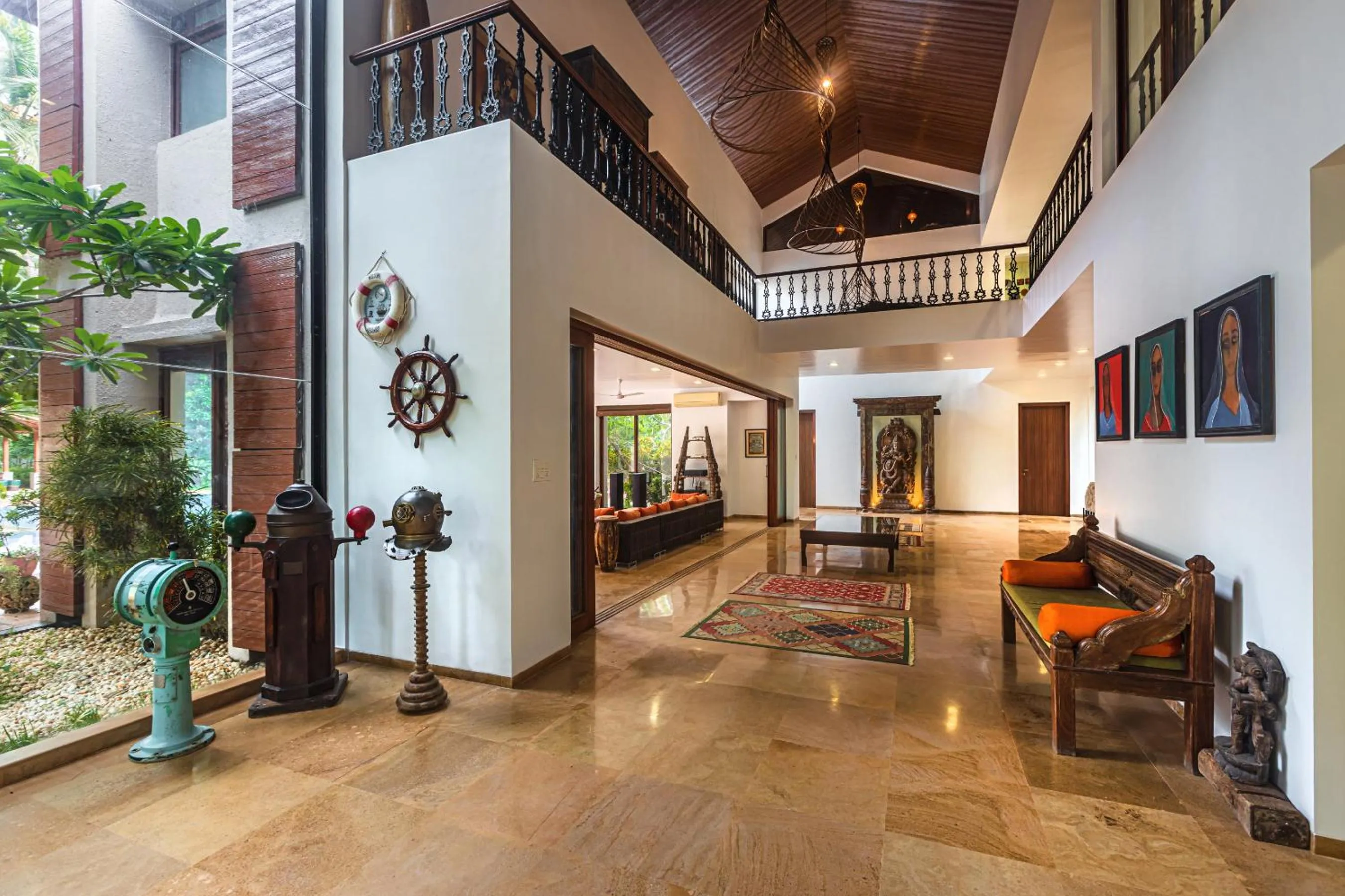 Living room in SaffronStays Casa Del Palms - 8BR luxury pool villa with gazebo, pickleball, bar & lawns near Nagaon Beach