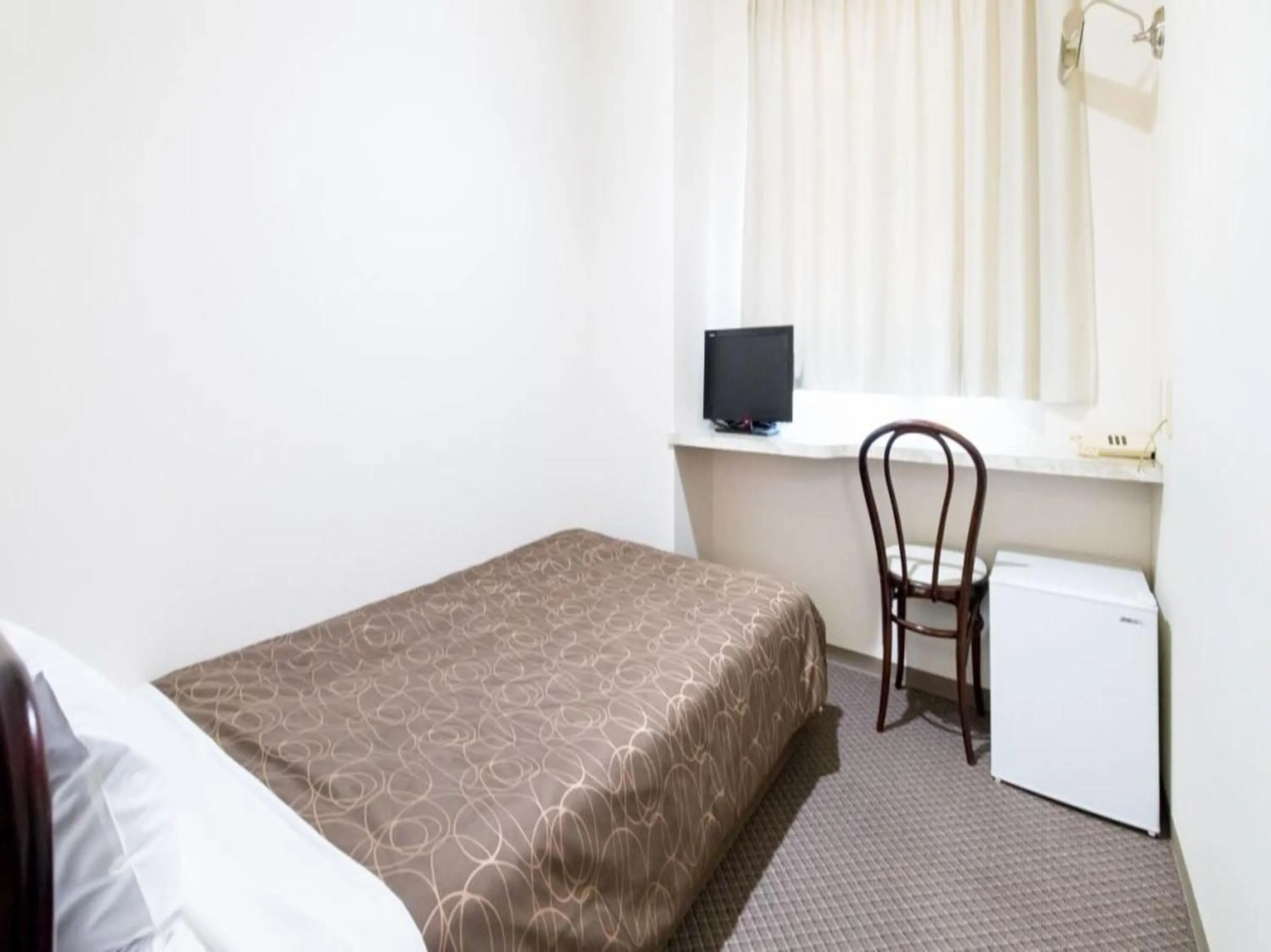 Bed in Business Hotel Kawashima