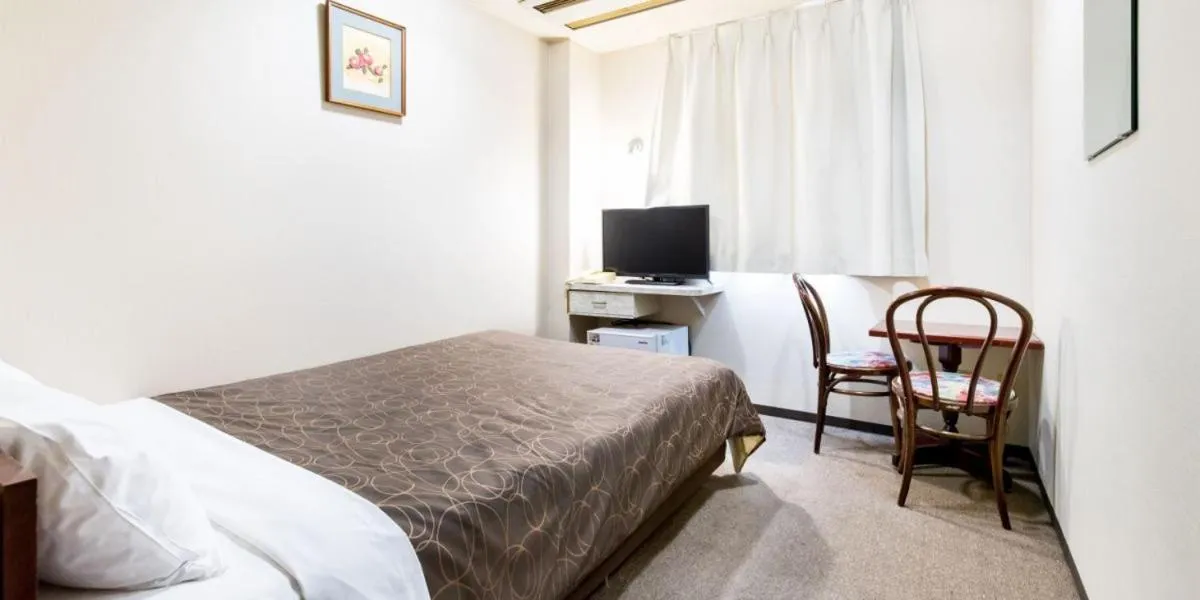 Bed in Business Hotel Kawashima