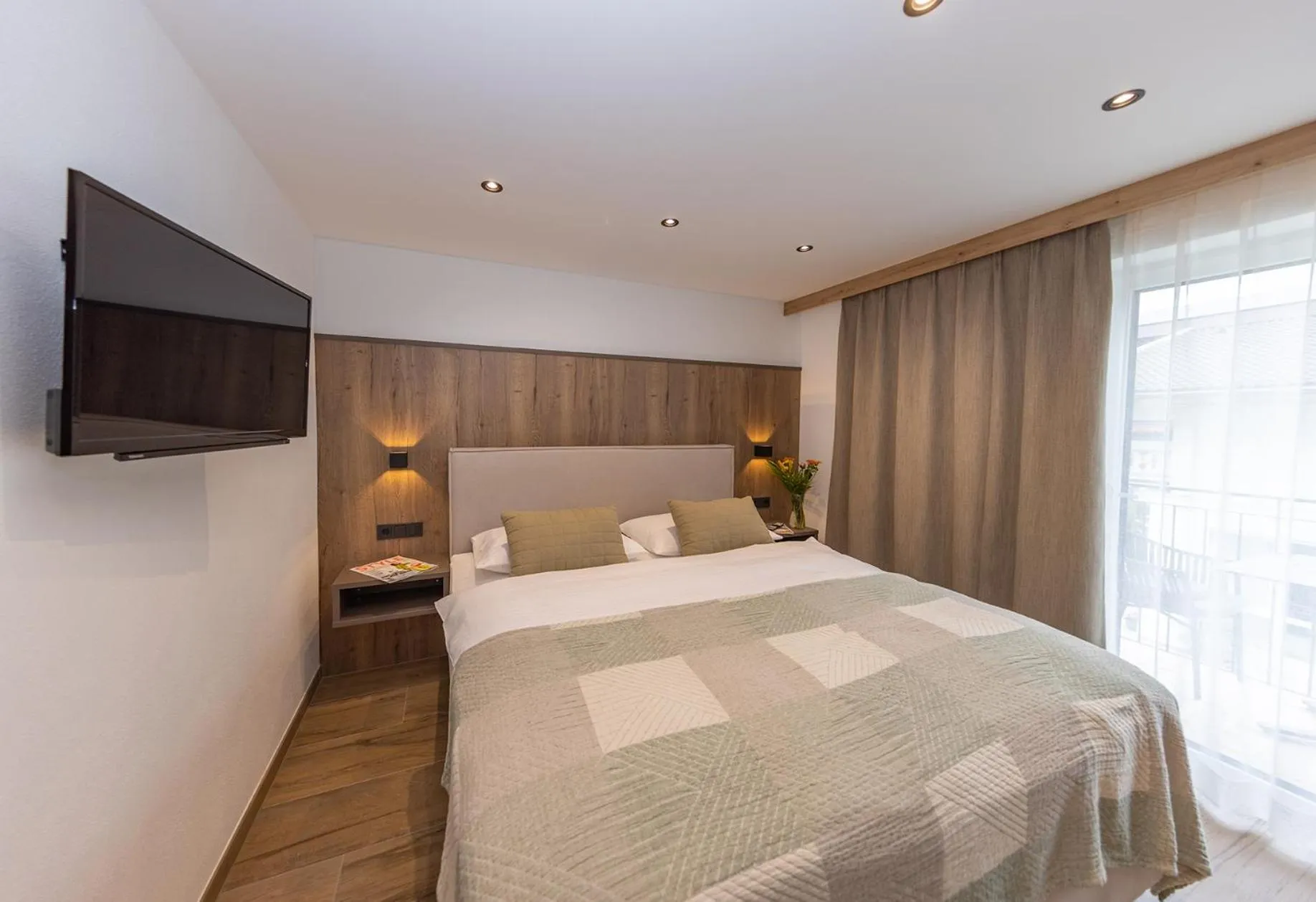 Bed in Lenni´s Apartments