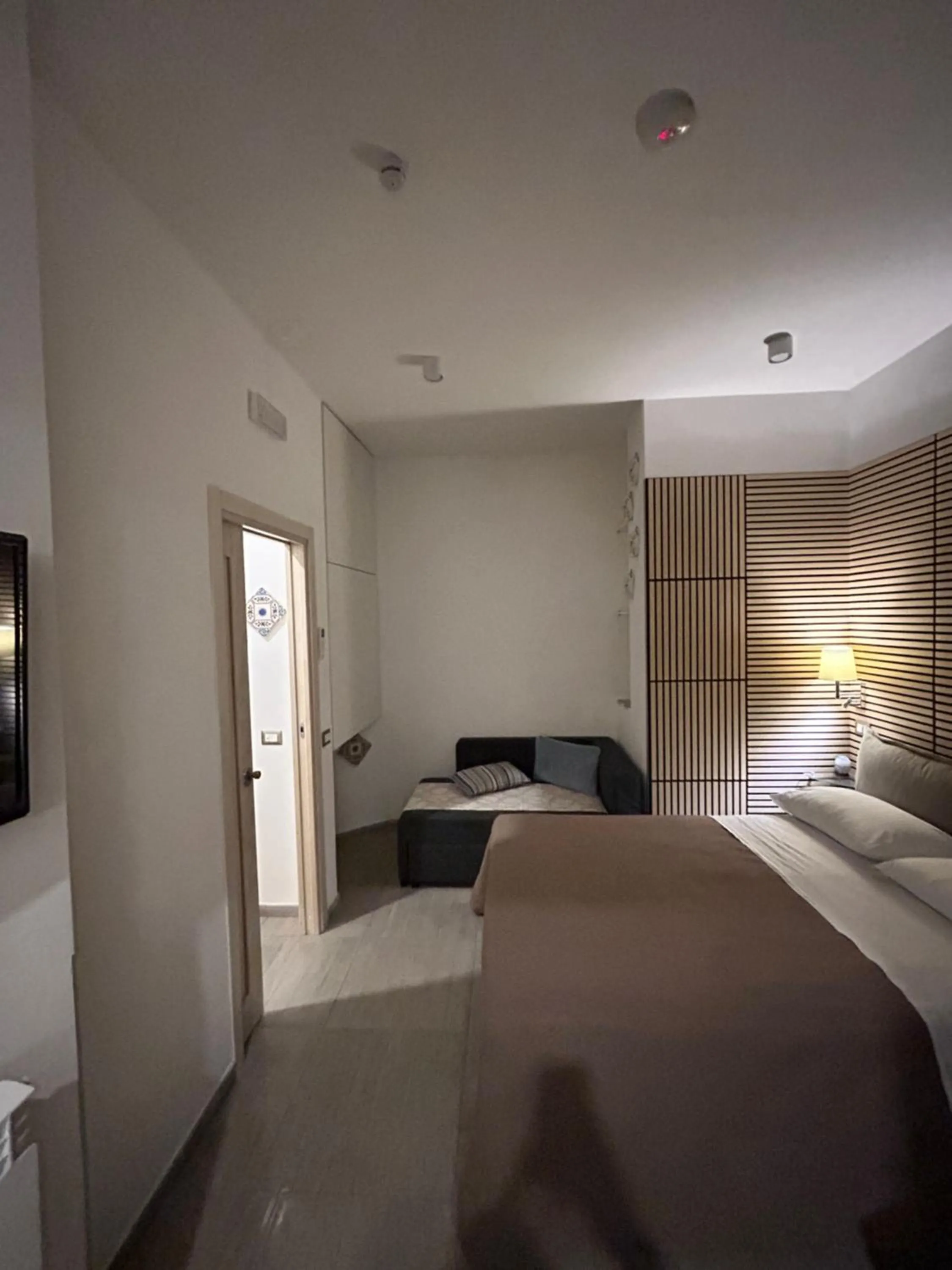 Bed in International Naples