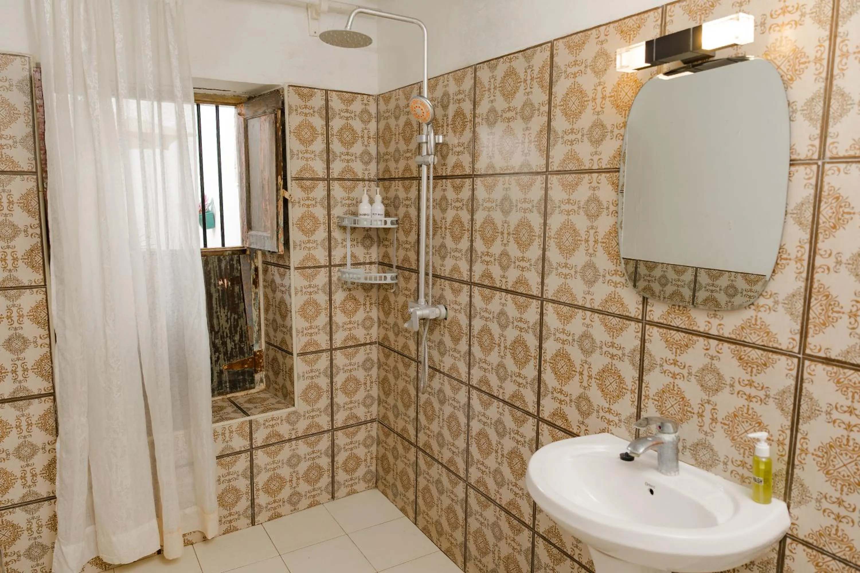 Shower in Emerald Palm Courtyard Hotel