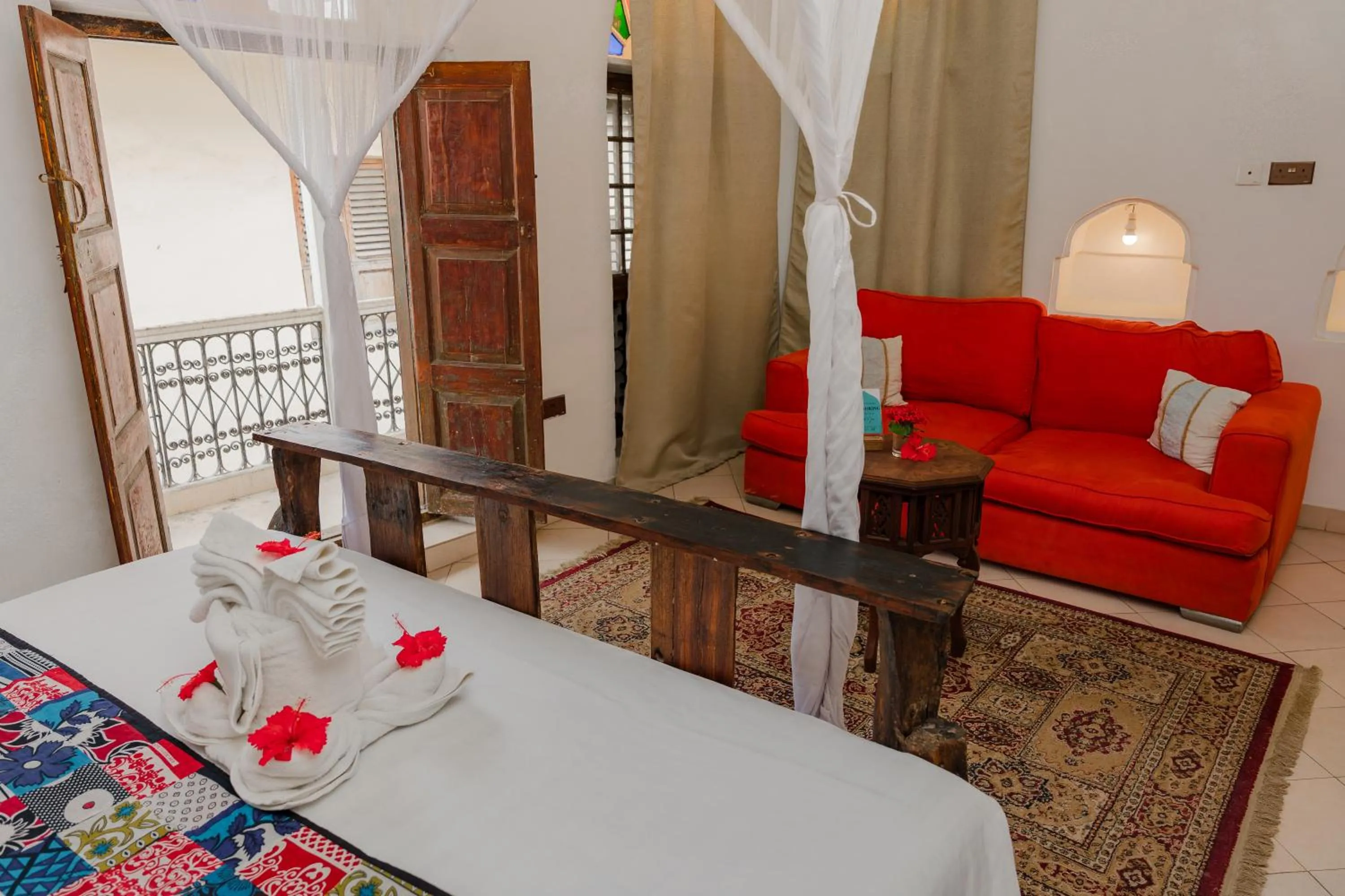 Bed in Emerald Palm Courtyard Hotel