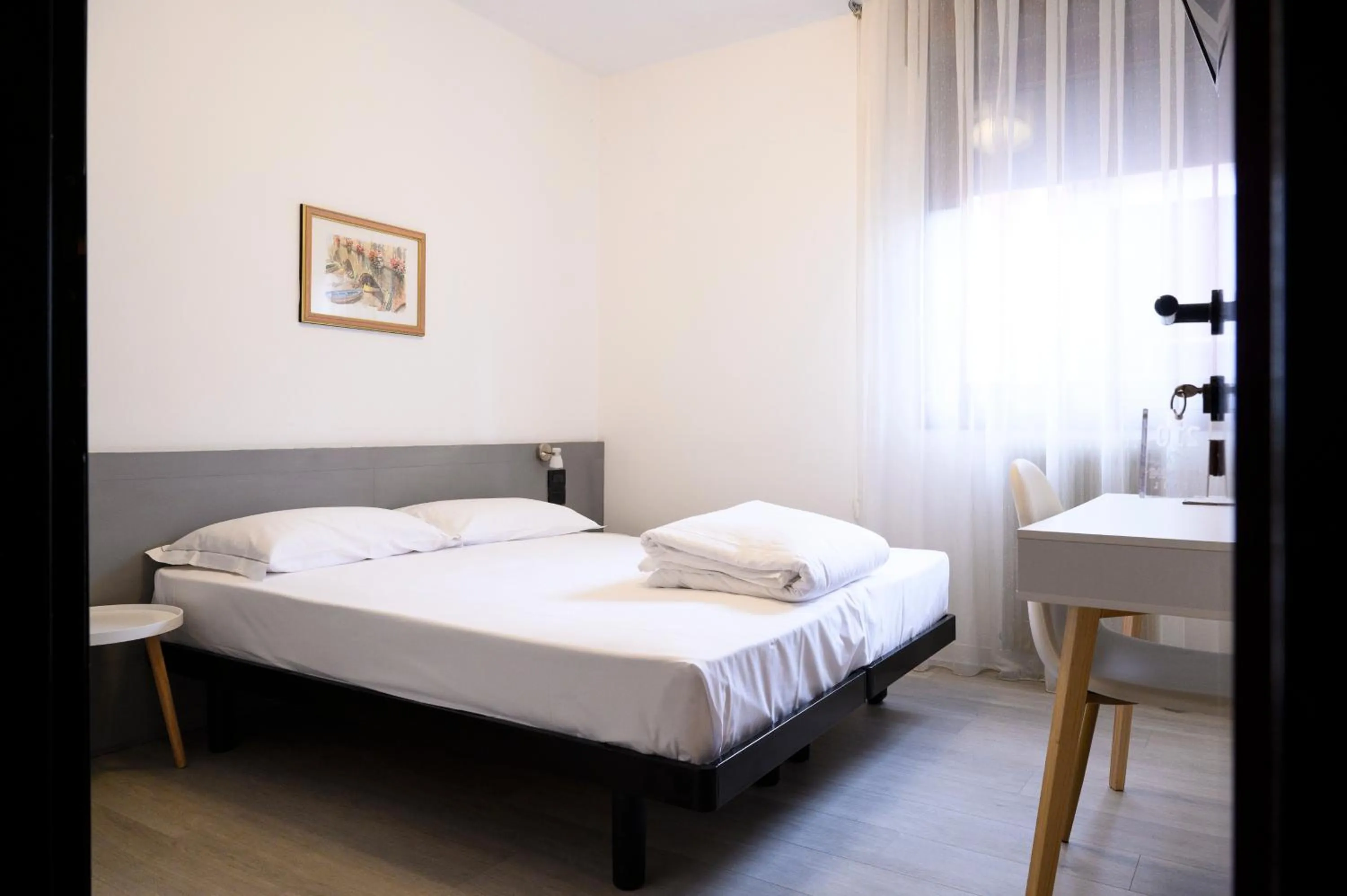 Bed in HG Hotel Due Ragni