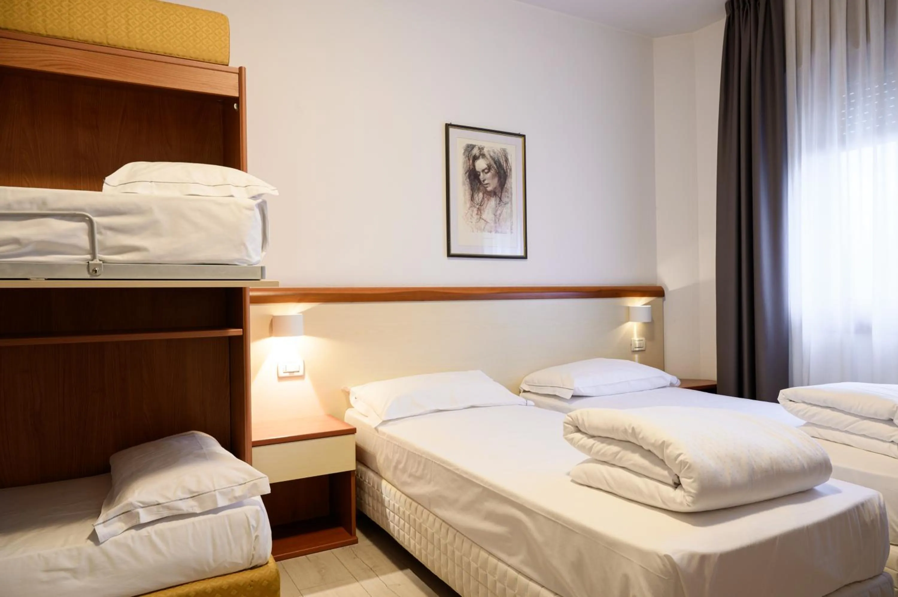 Bed in HG Hotel Due Ragni