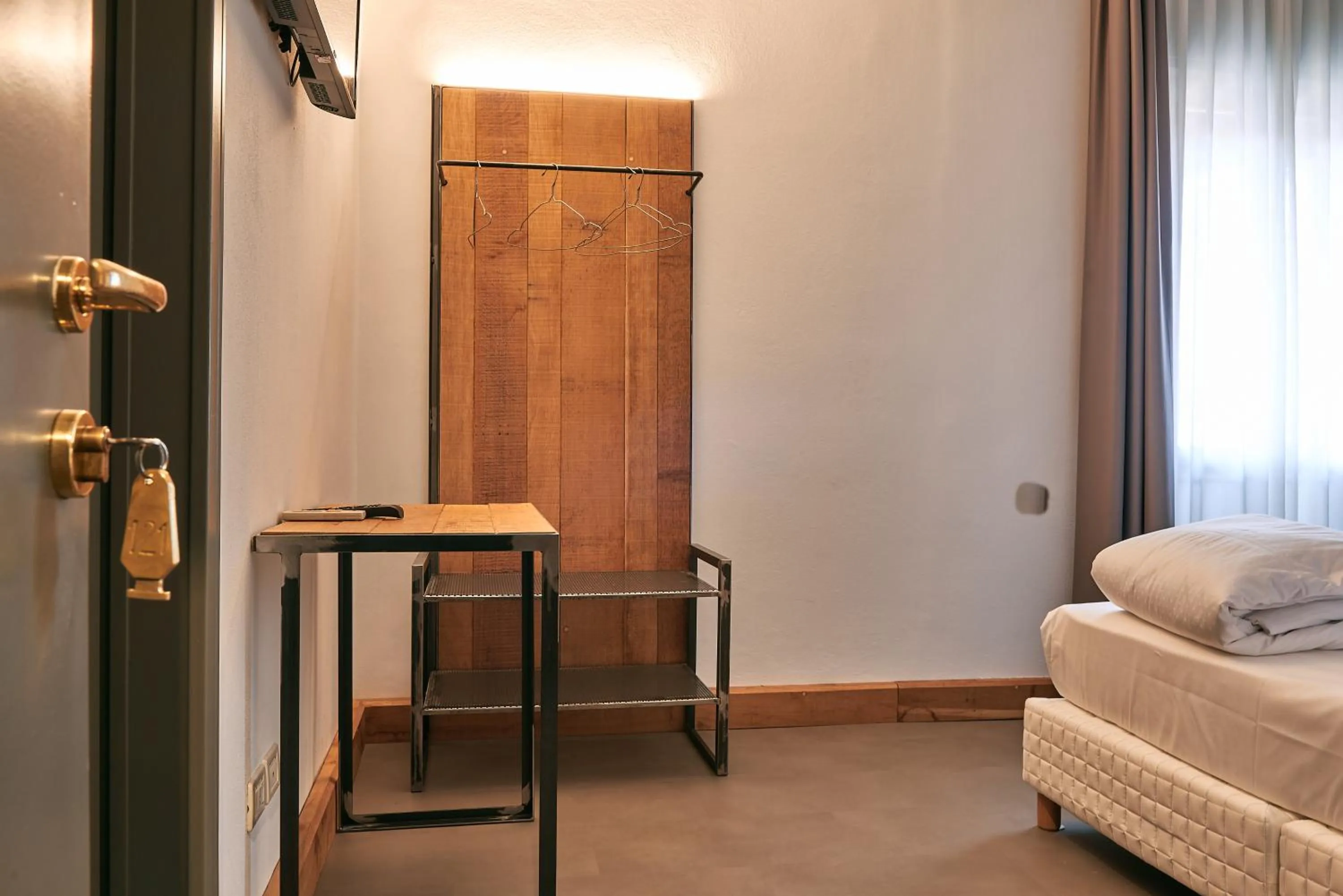 Bed in HG Hotel Due Ragni