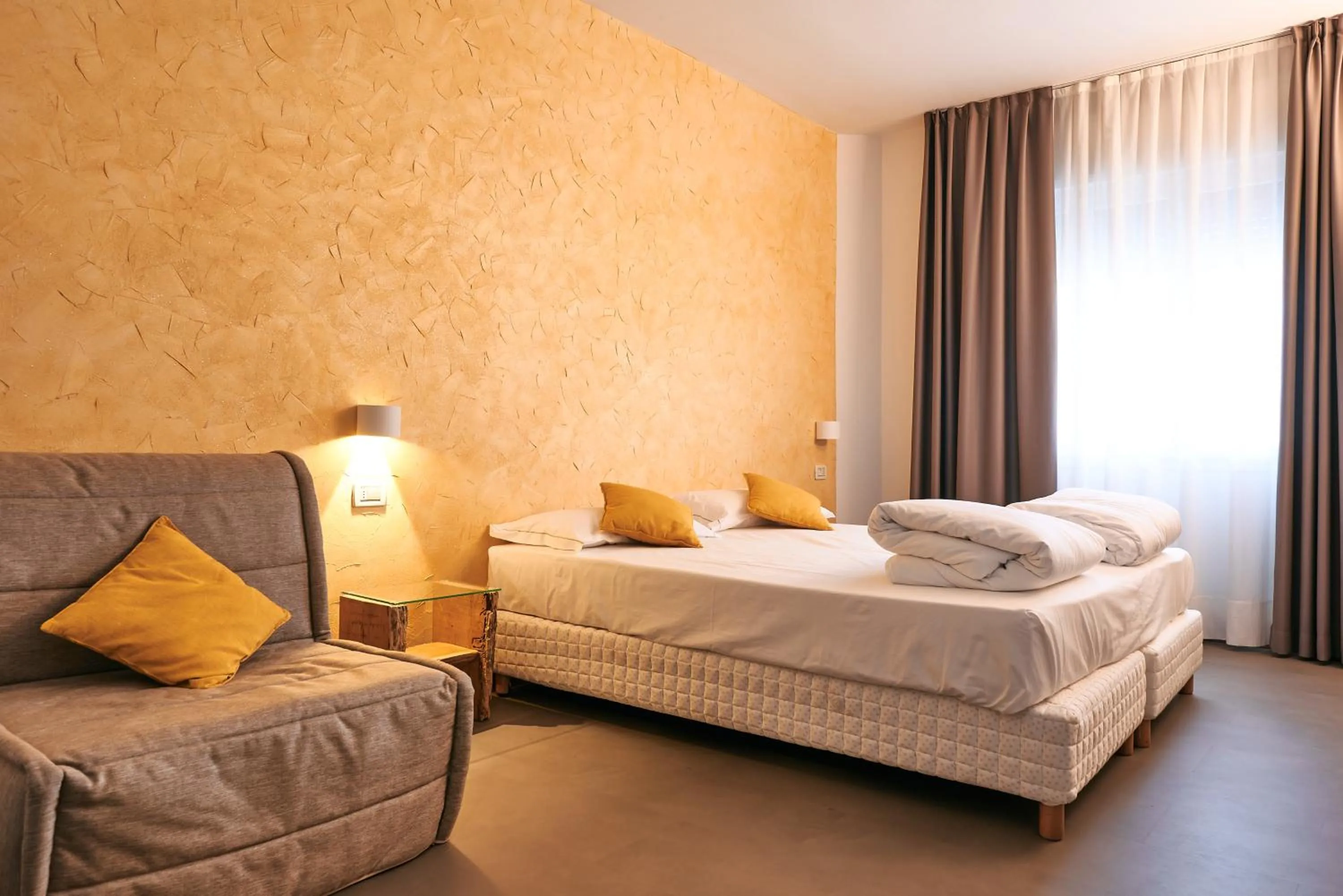 Bed in HG Hotel Due Ragni