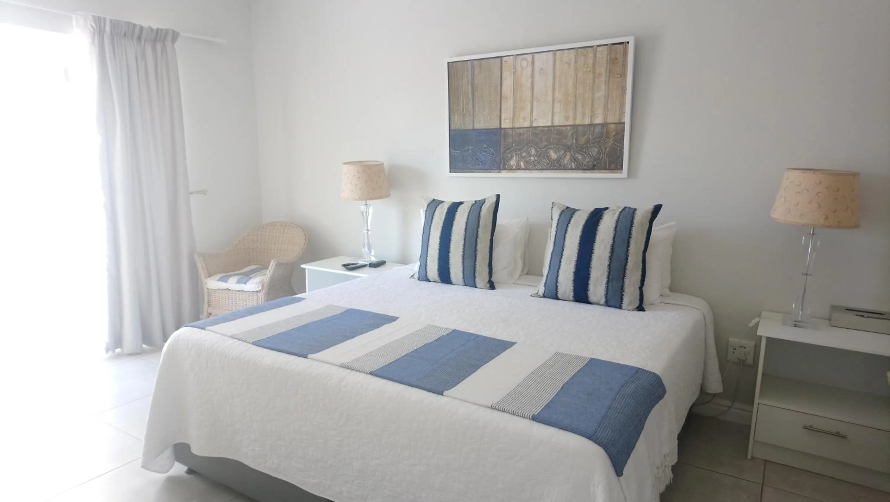 Bed in Conifer Beach House