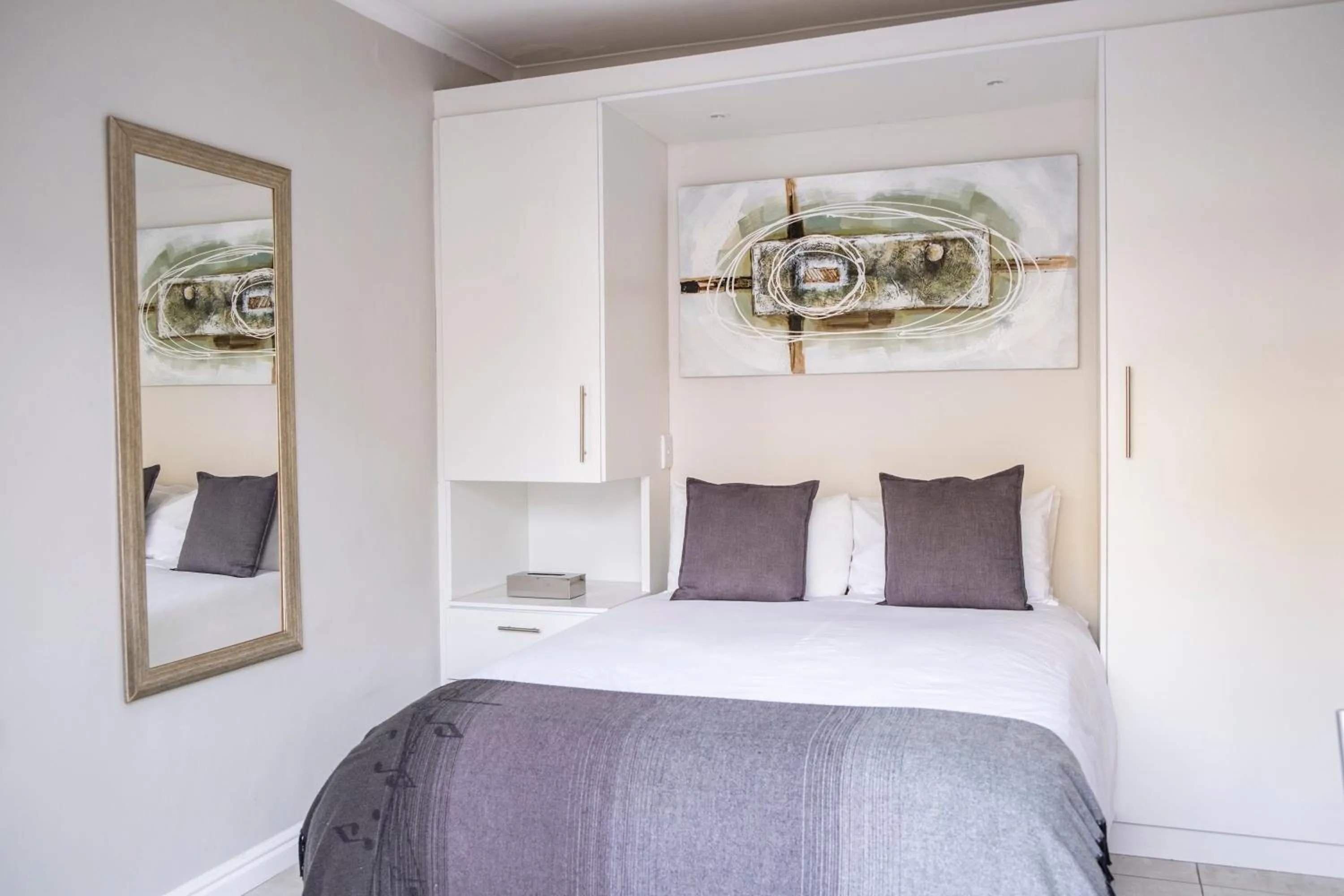 Bed in Conifer Beach House