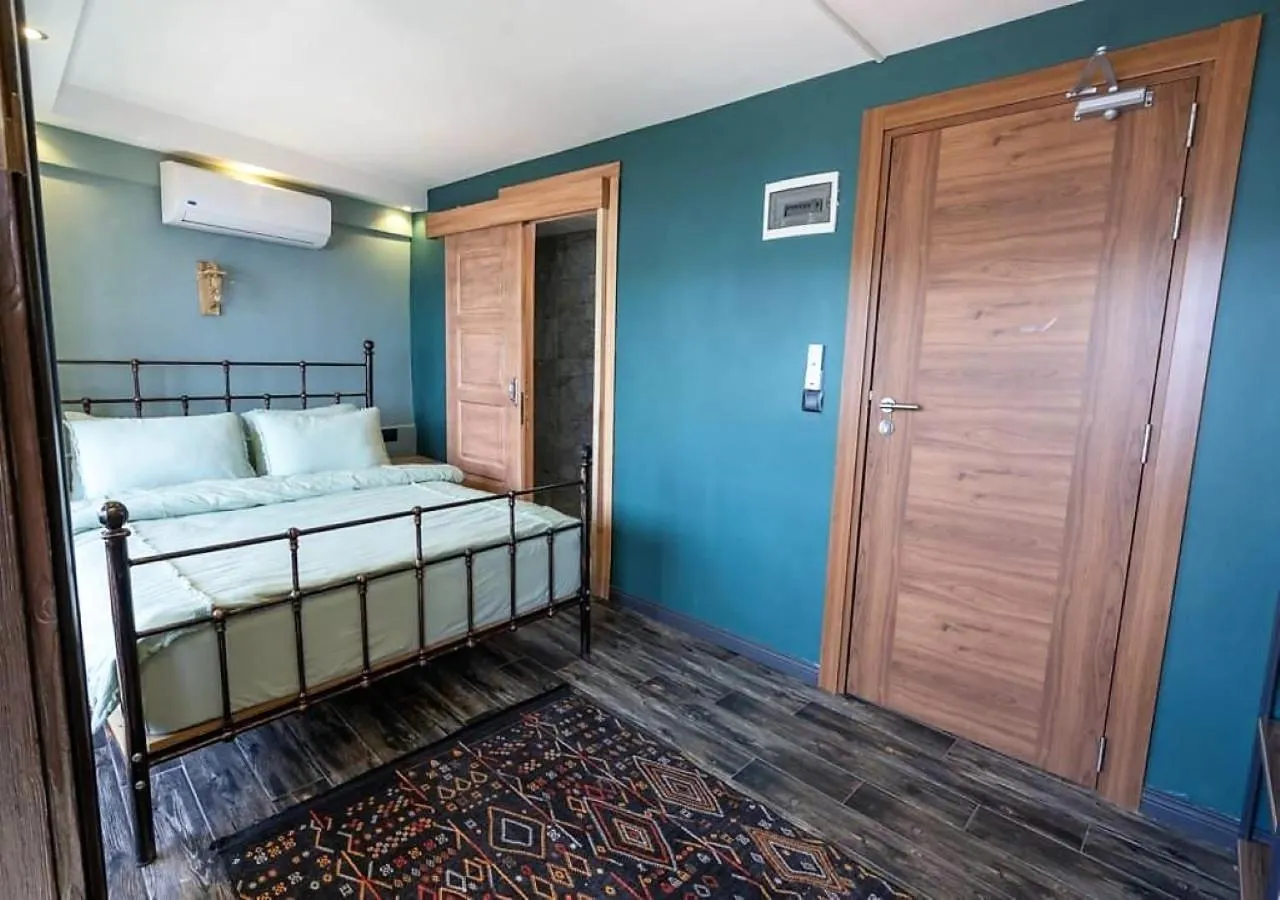 Bed in Liman Deluxe Hotel