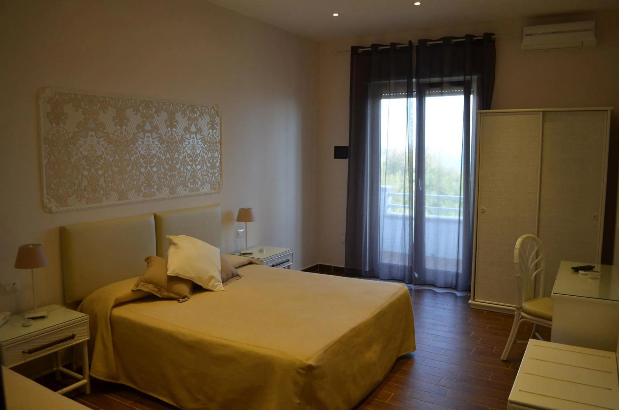 Photo of the whole room, Bed in Mini Hotel - Angolo Di Paradiso -